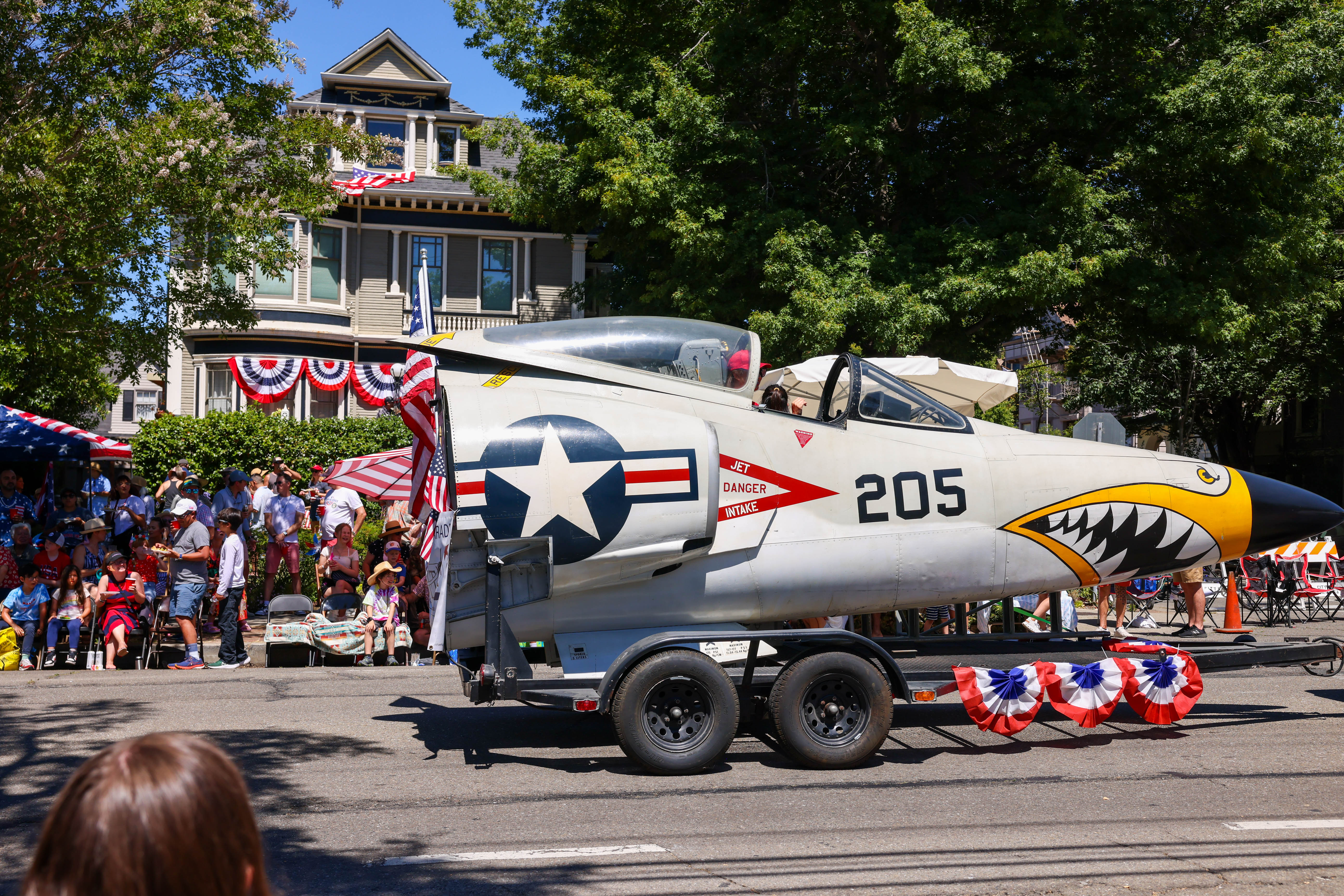 The USS Hornet Sea, Air, & Space Museum participates with its Jet Cockpit during the annual Fourth of July Parade in Alameda, Calif., on Thursday, July 4, 2024. (Ray Chavez/Bay Area News Group)