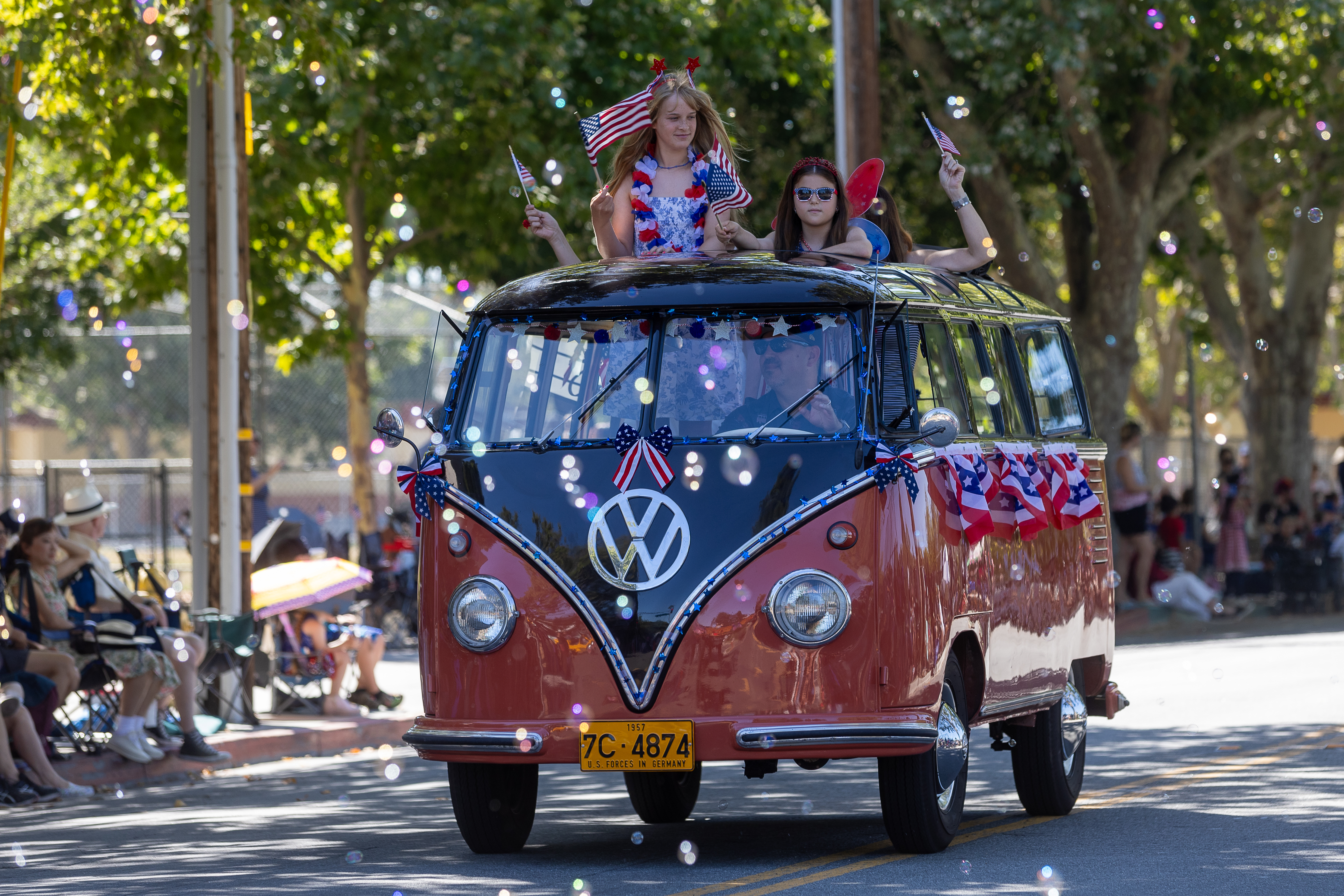 A classic 23-window 1957 Volkswagen bus joins San Jose's festive Rose, White and Blue 4th of July Parade on the streets of the city's Rose Garden neighborhood, Thursday, July 4, 2024. (Karl Mondon/ Bay Area News Group)
