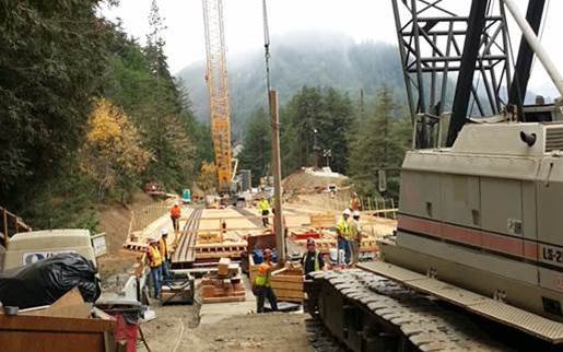 Caltrans workers remove falsework from the new bridge over Pfeiffer Canyon in Big Sur in early September 2017.