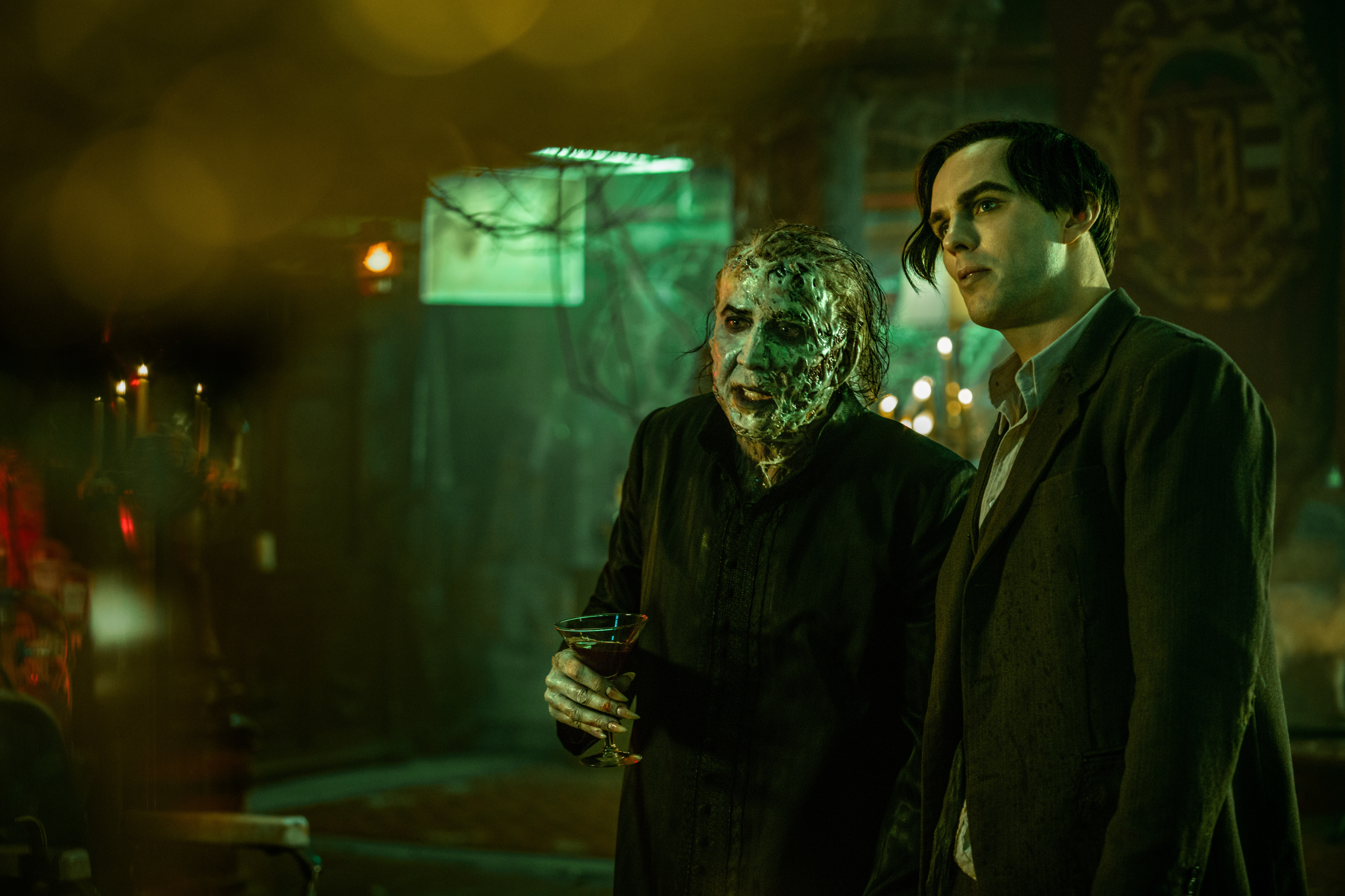 Times have been tough lately for Dracula (Nicolas Cage, left), talking with his assistant, Renfield (Nicholas Hoult), in a scene from "Renfield." (Courtesy of Universal Pictures)