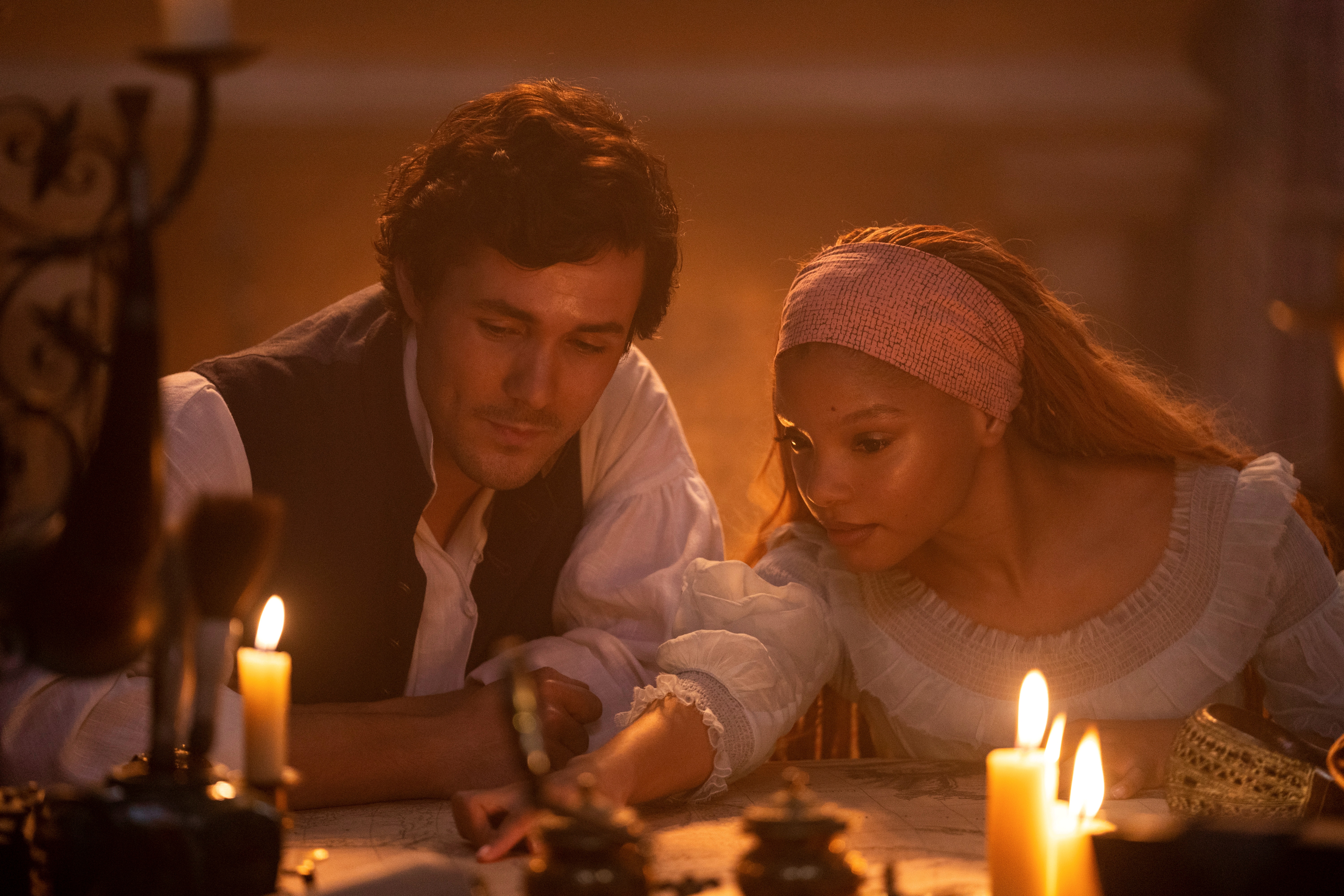 Jonah Hauer-King, as Prince Eric, and Halle Bailey, as Ariel, appear in a scene from Disney's live-action update of "The Little Mermaid." (Courtesy of Disney Enterprises)