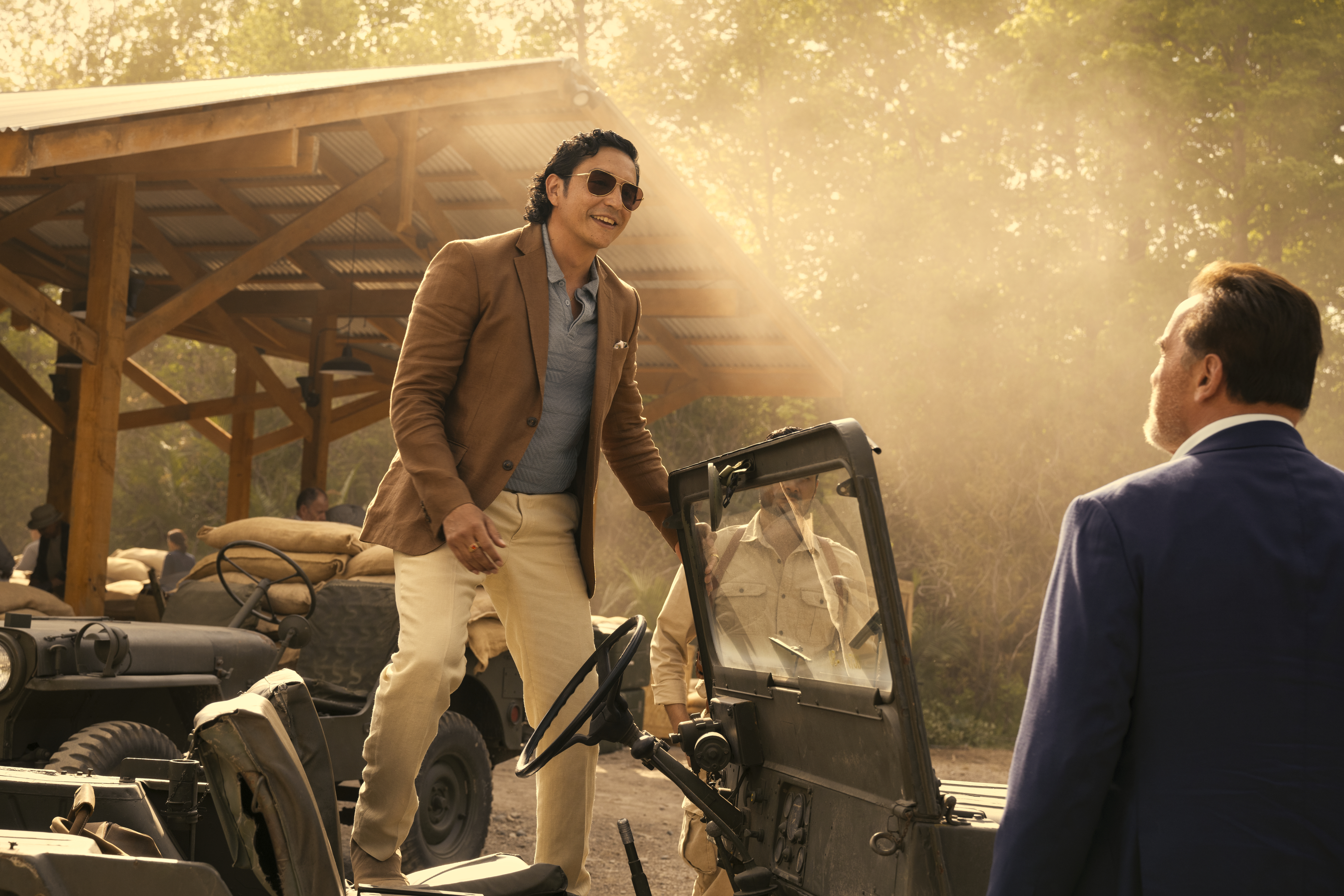 Gabriel Luna, left, and Arnold Schwarzenegger appear in a scene from 'FUBAR." (Courtesy of Netflix)