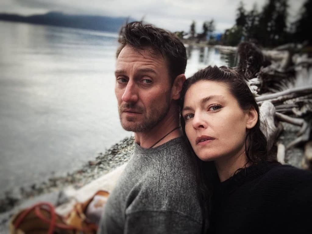 Josh Stewart and his wife