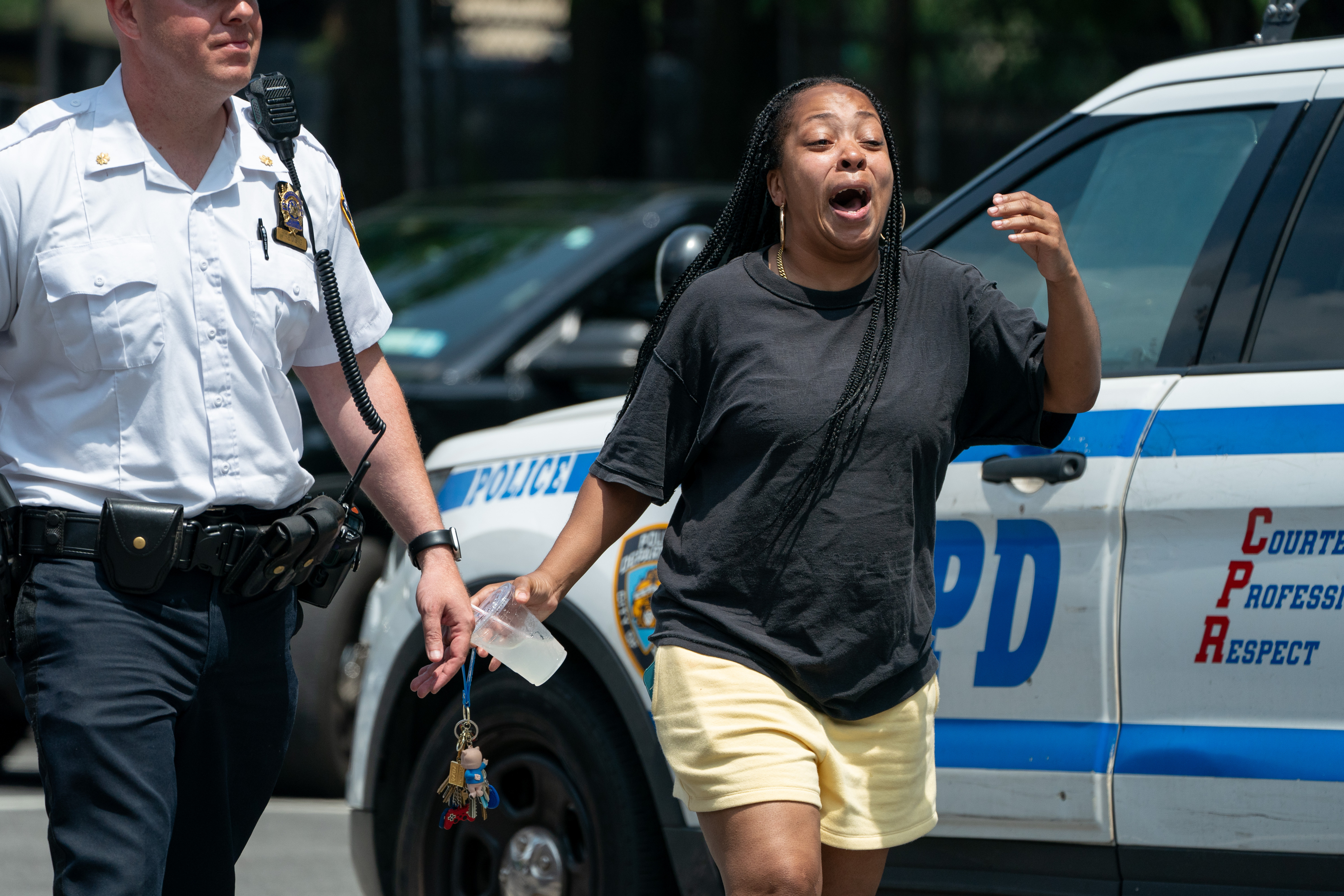 A relative to one of the people killed Thursday reacts as Daniel Haden is walked from the 7th Pct. Friday, July 5, 2024 in Manhattan, New York. (Barry Williams for New York Daily News)