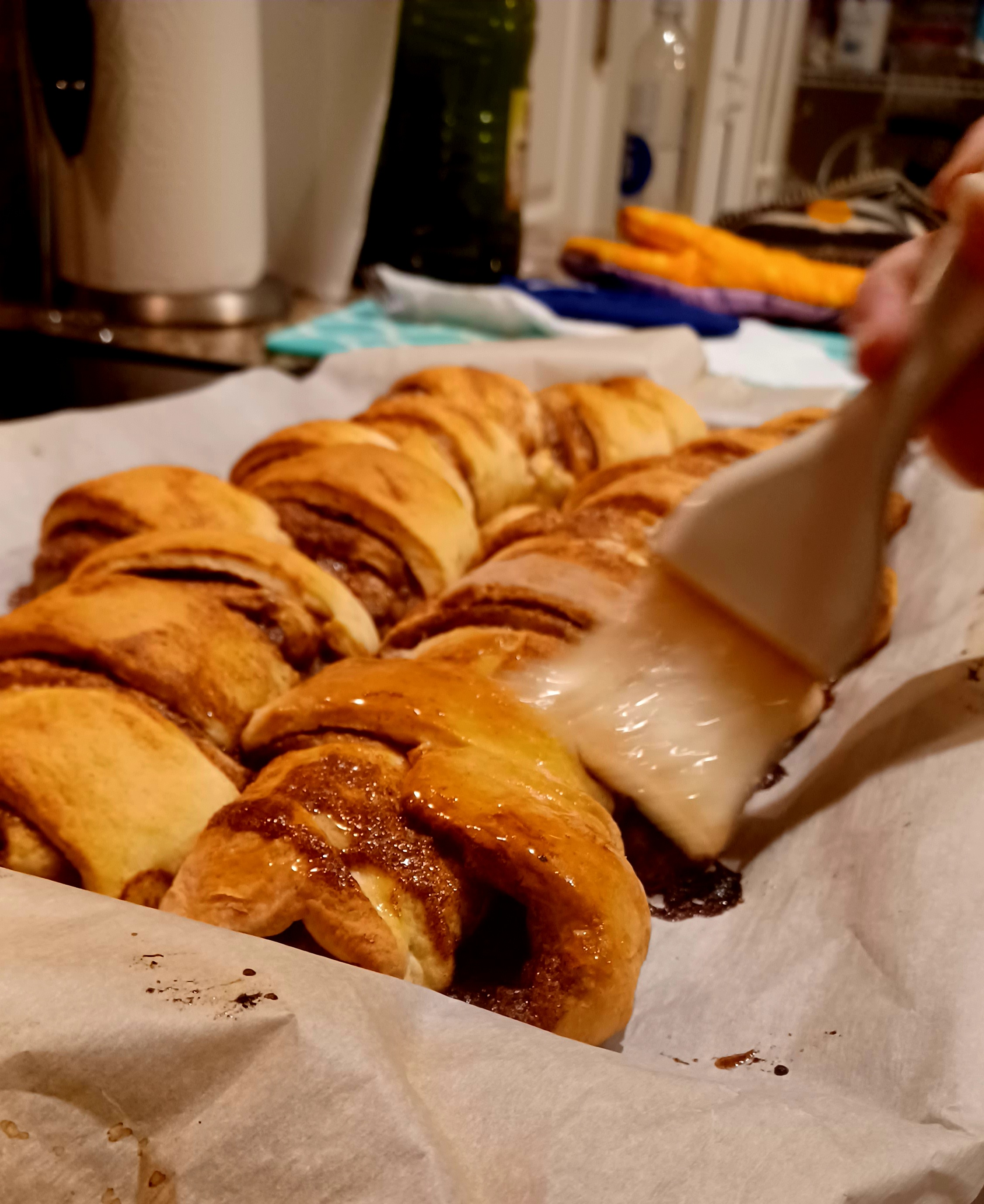 Sugar syrup gets brushed on while pastry is still warm. Glaze later, when cool. (Amy Drew Thompson/Orlando Sentinel)