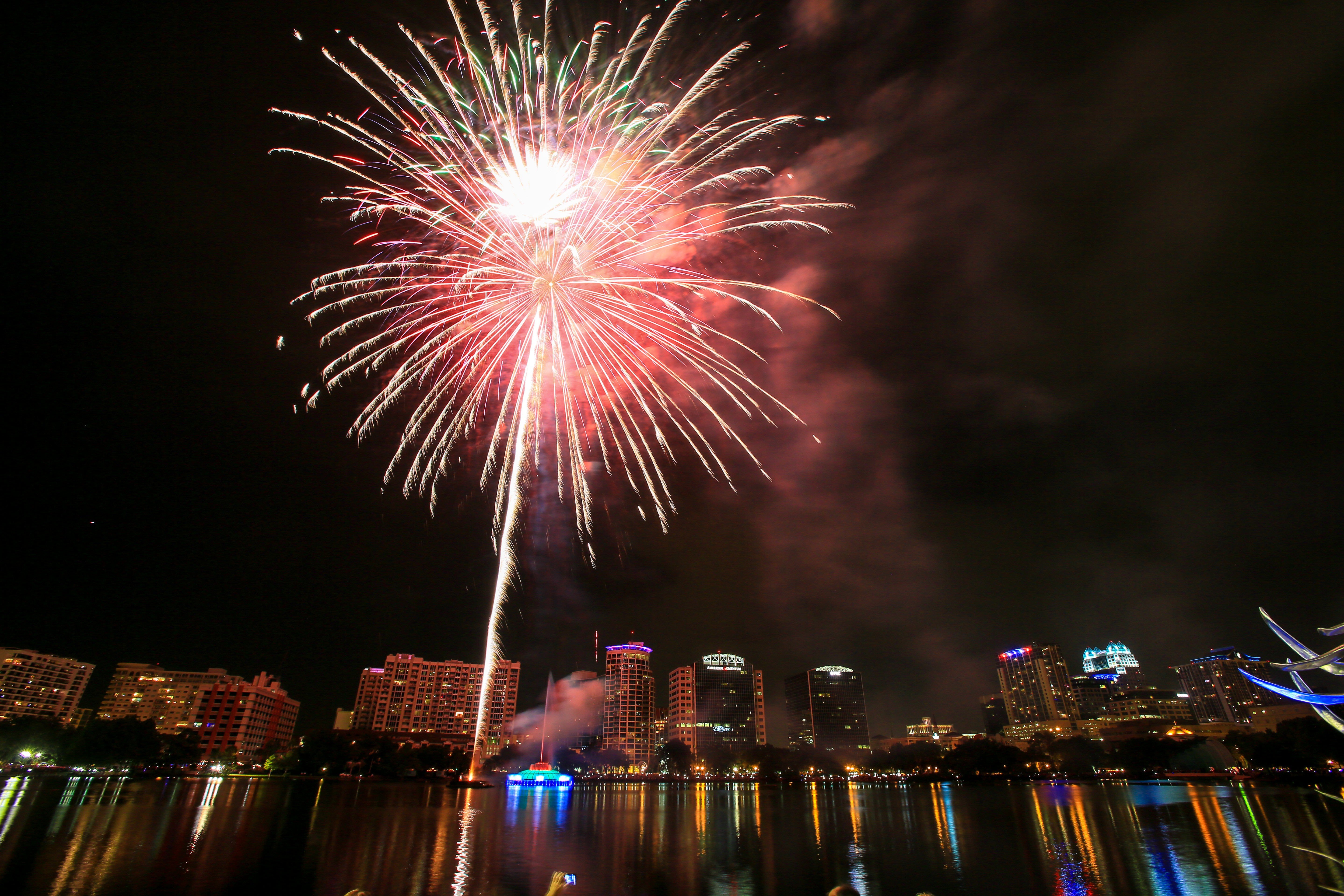 Crowds gather at Lake Eola in downtown to watch the annual fireworks display in Orlando, Fla. on Saturday July 04, 2015. (Joshua C. Cruey Orlando Sentinel)