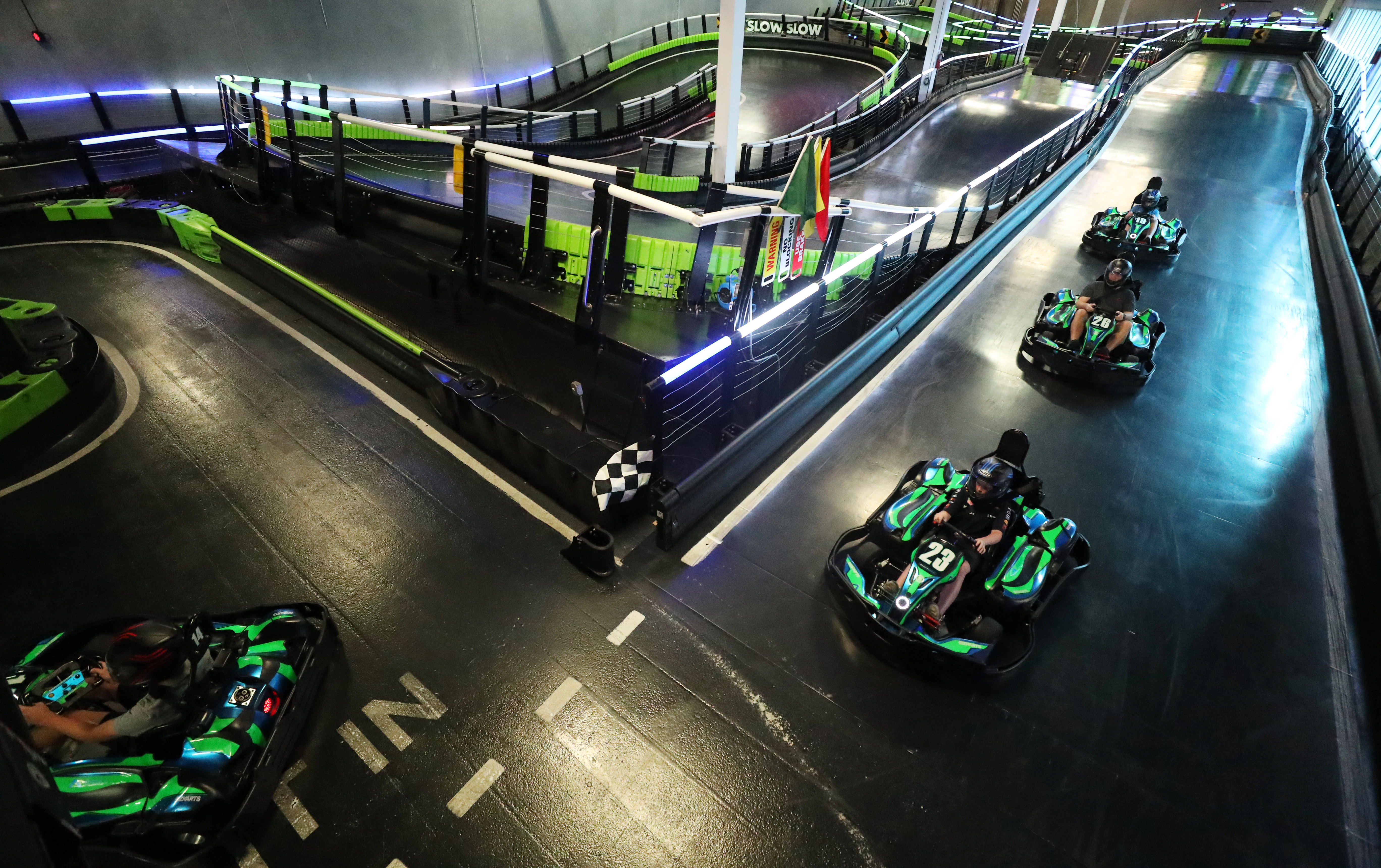 Race in the intermediate track at Andretti Indoor Karting and Games Orlando, on Tuesday, March 14, 2023. (Ricardo Ramirez Buxeda/ Orlando Sentinel)