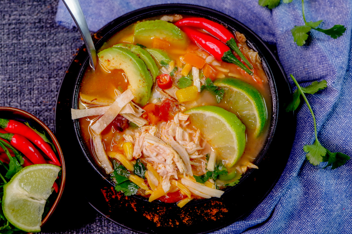 This Instant Pot Chicken Tortilla Soup is a perfect comfort food meal that comes together in minutes using your electric pressure cooker with amazing authentic flavours!