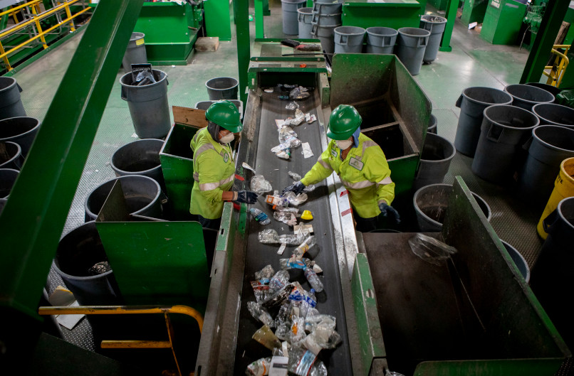 FILE PHOTO-LAKE COUNTY PUBISHINGWorkers sort through plastic items on a conveyor belt at greenwaste recycling facility in San Jose. (Photo by Anne Wernikoff for CalMatters)