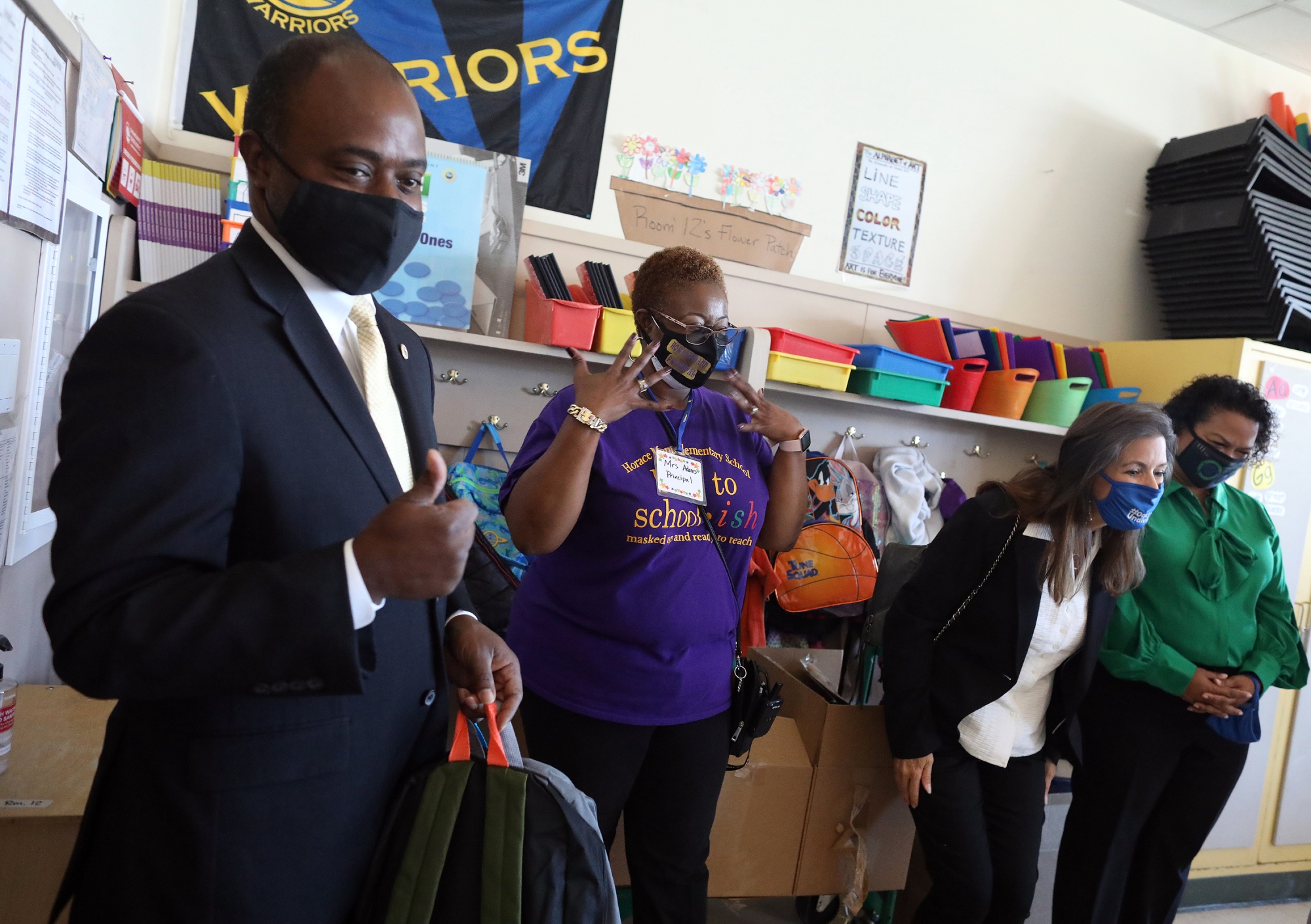 State Superintendent of Public Instruction Tony Thurmond, left, principal Tammie Adams, center, and Mayor Libby Schaaf, third from left, visit a classroom at Horace Mann Elementary School on Monday, Aug. 9, 2021, in Oakland, Calif. (Photo: Aric Crabb/Bay Area News Group)