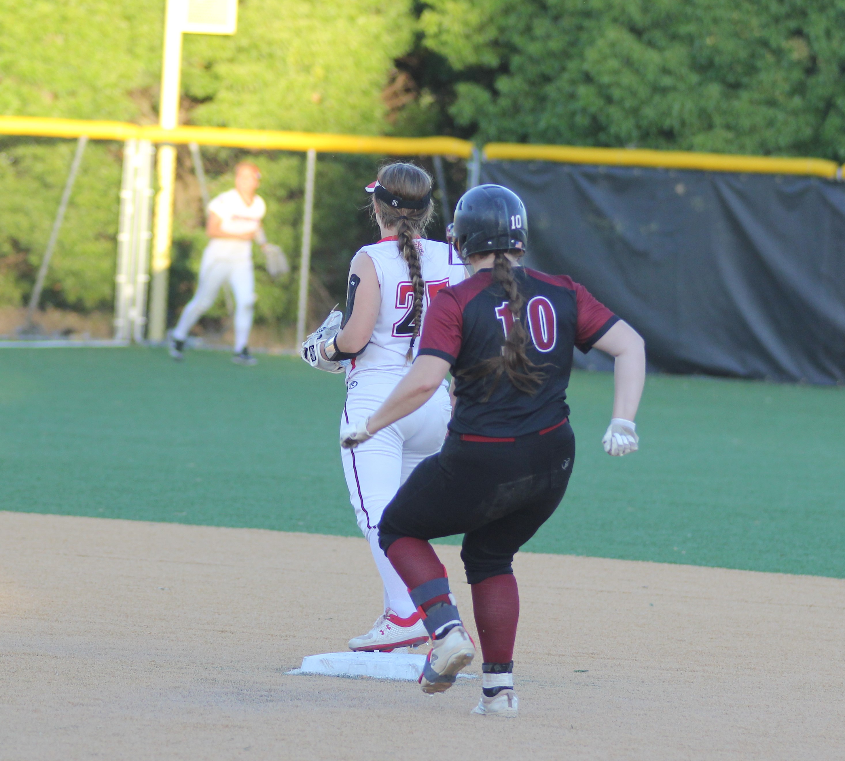 Clear Lake's Hailee Bussard pulls into second base with a double with two outs in the top of the fourth inning. (Photos by Bob Minenna)