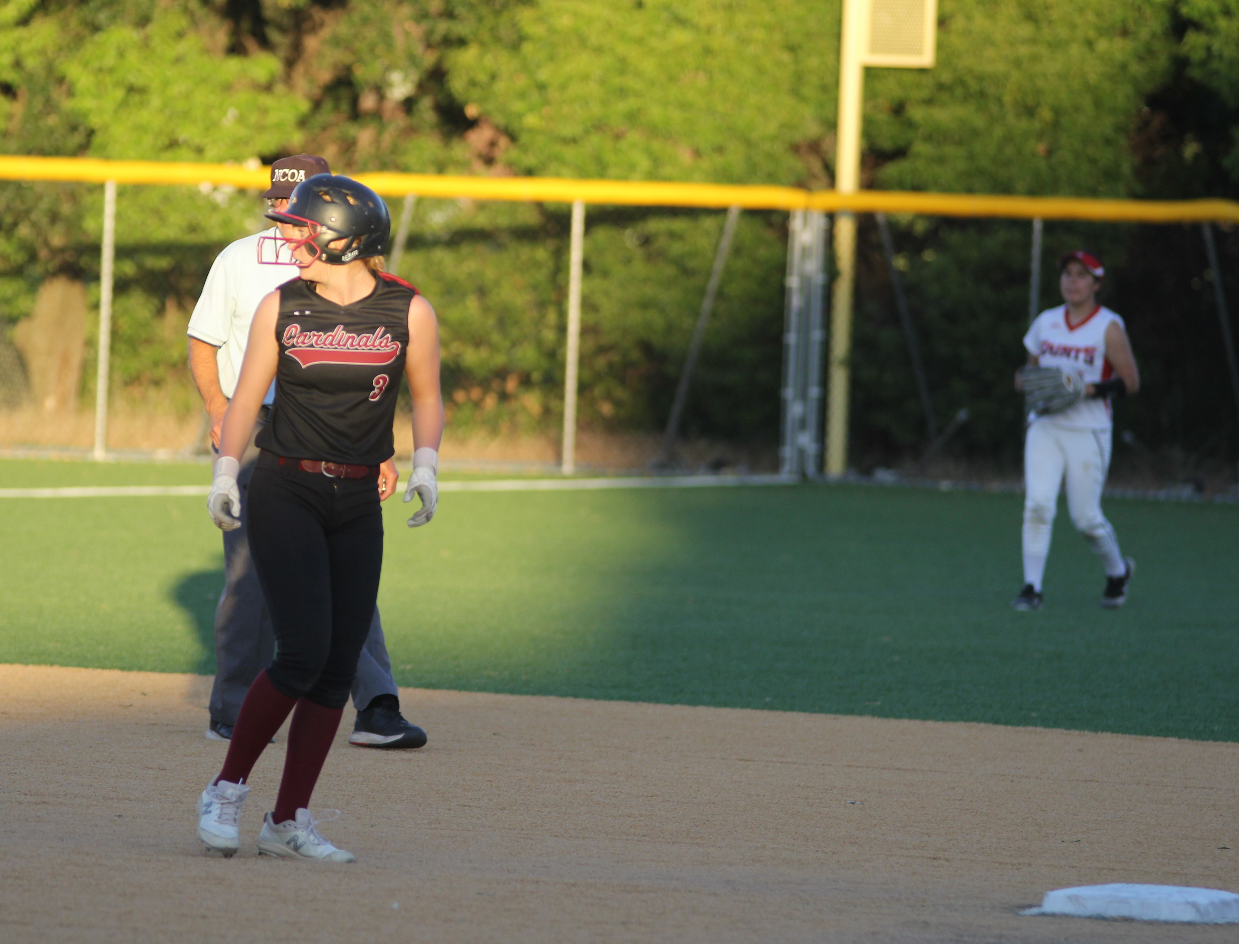 Clear Lake's Sierra Bruch retreats to second base after doubling home a run in the top of the fourth.