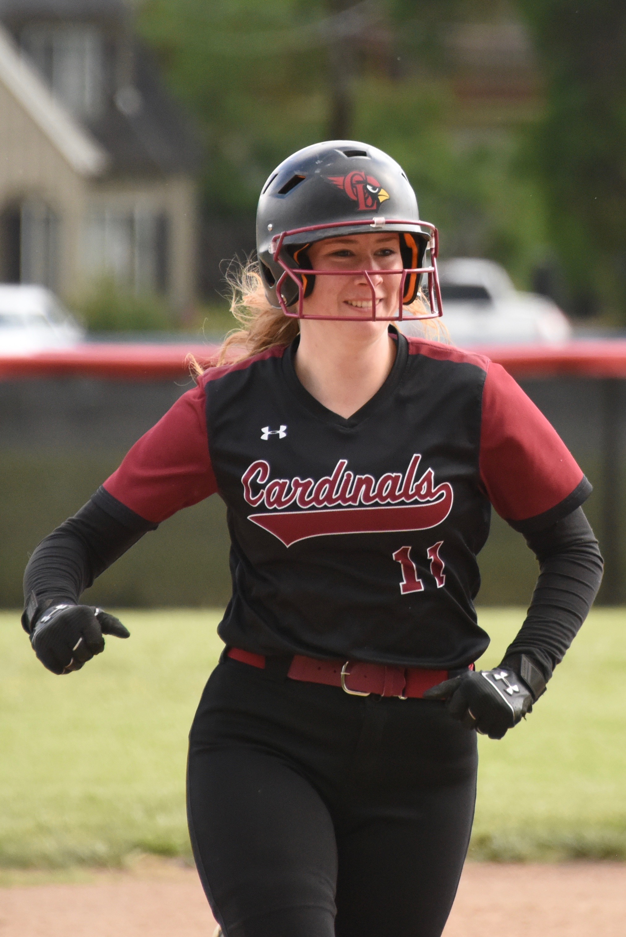 Stella Hill approaches third base as she circles the bases in the bottom of the fifth.