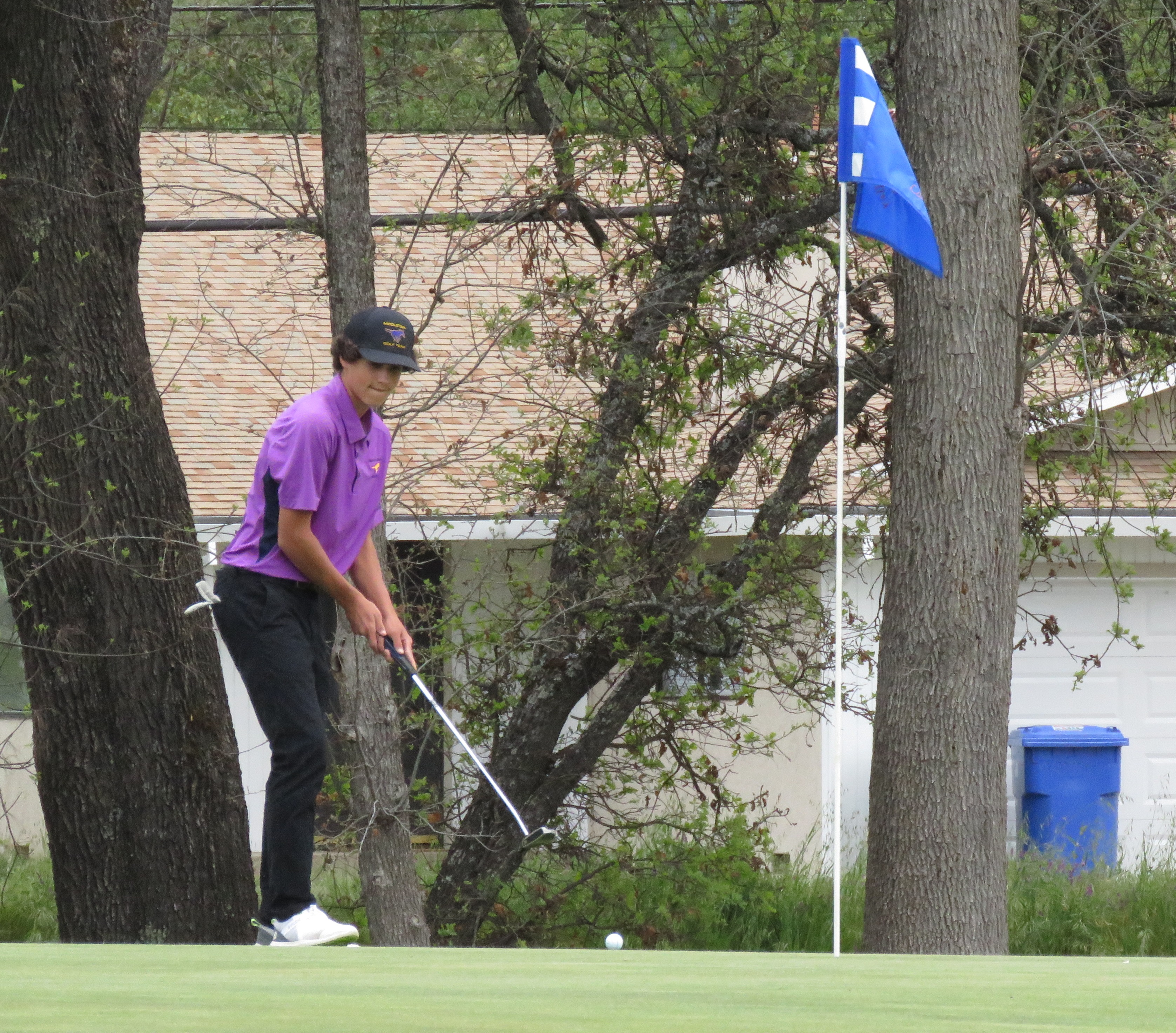 Bodhi Moore of Middletown follows his putt toward the pin. Moore, only a freshman, has been named to the All-Coastal Mountain Conference South first team in golf.