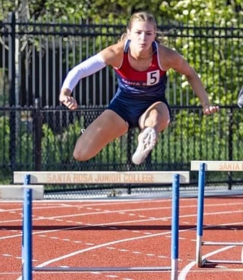 Tianna Jardstrom clears a hurdle during a meet earlier this season. (Courtes photo)