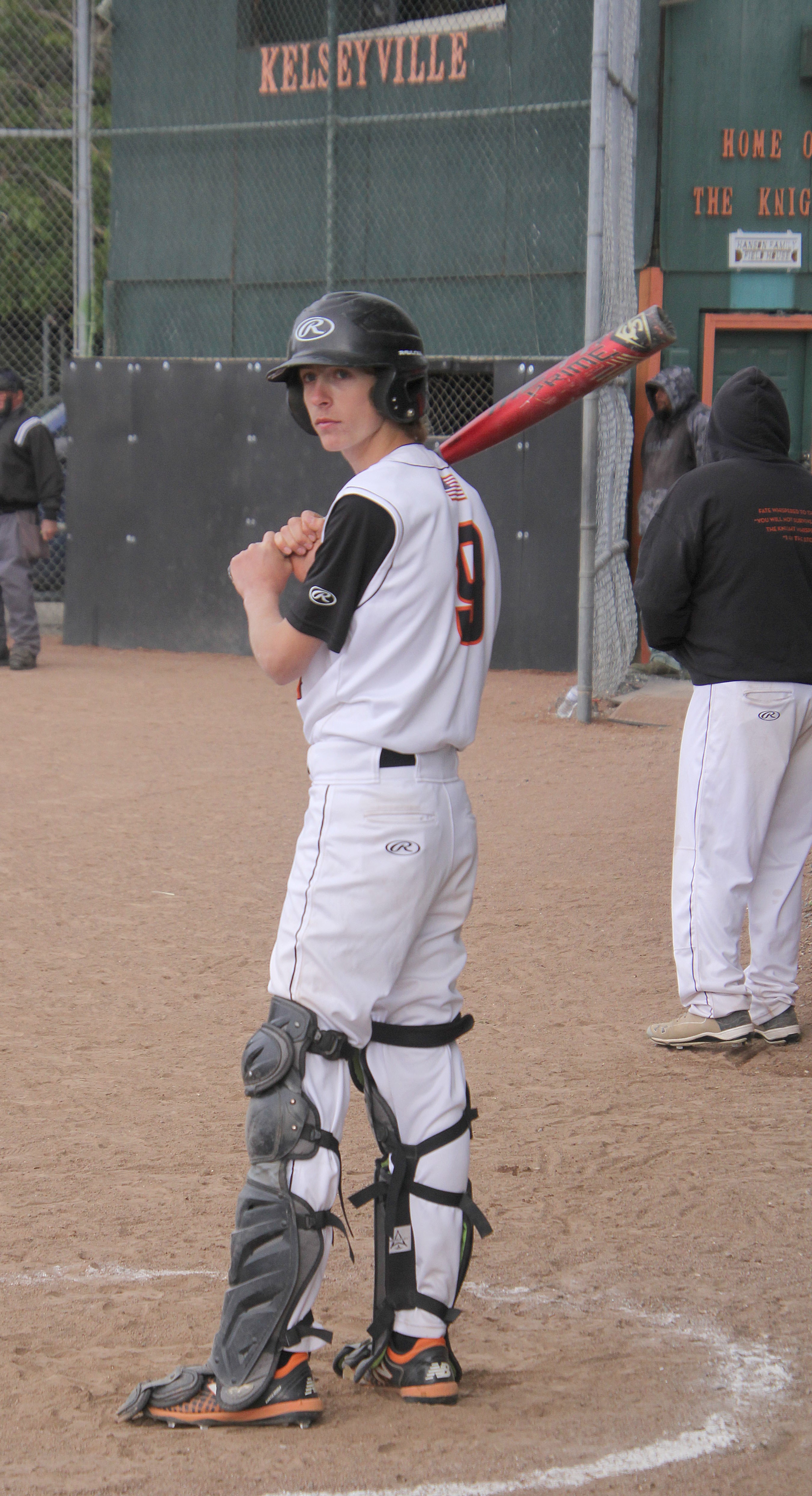 Kelseyville catcher Joey Gentle waits to take his turn at bat in the on-deck circle.
