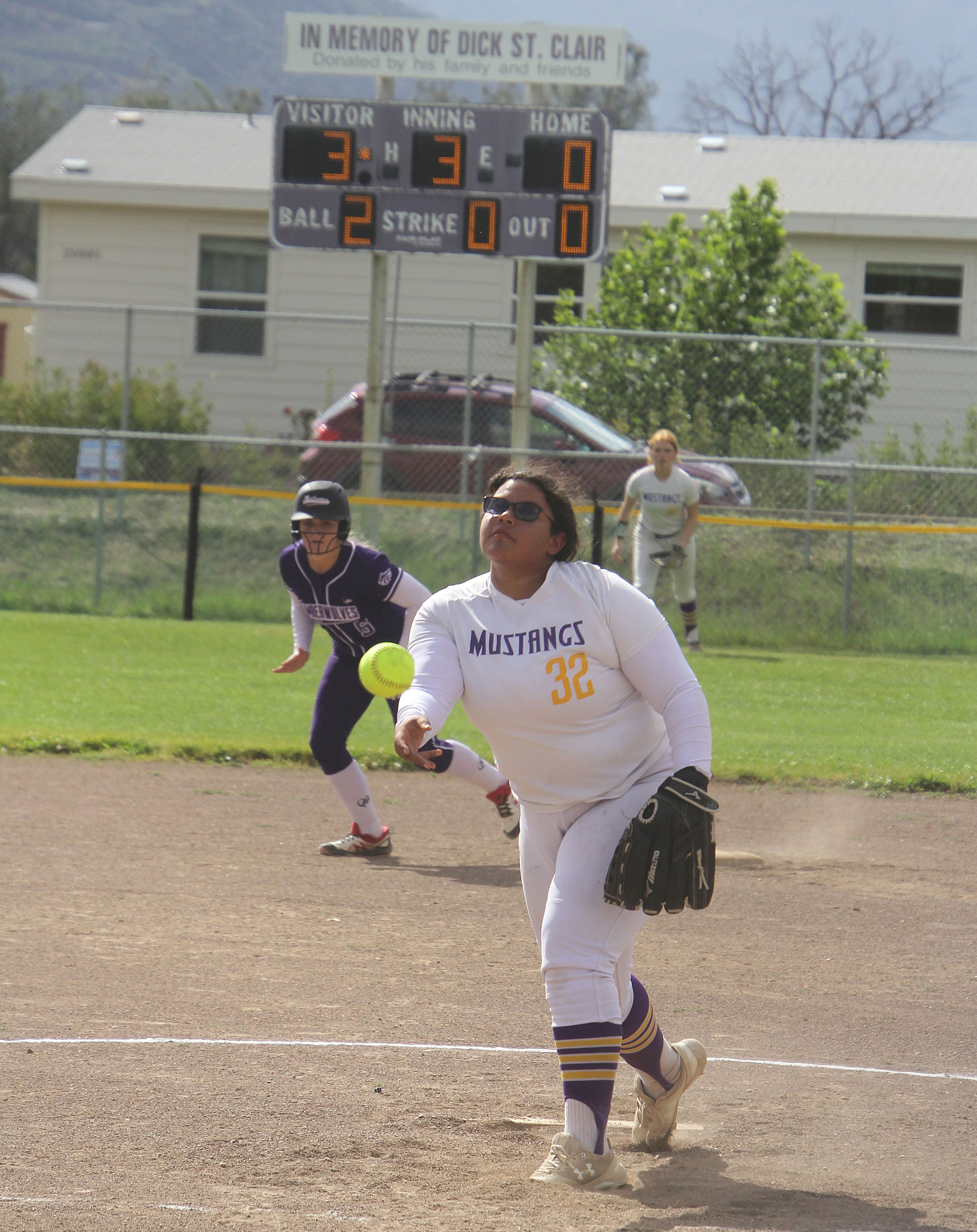 A Fort Bragg player breaks from second base as Middletown pitcher Shaylynn Sims delivers a pitch to the plate in the top of the third inning Friday afternoon in Middletown. Fort Bragg won 15-1 in six innings. (Photo by Bob Minenna)