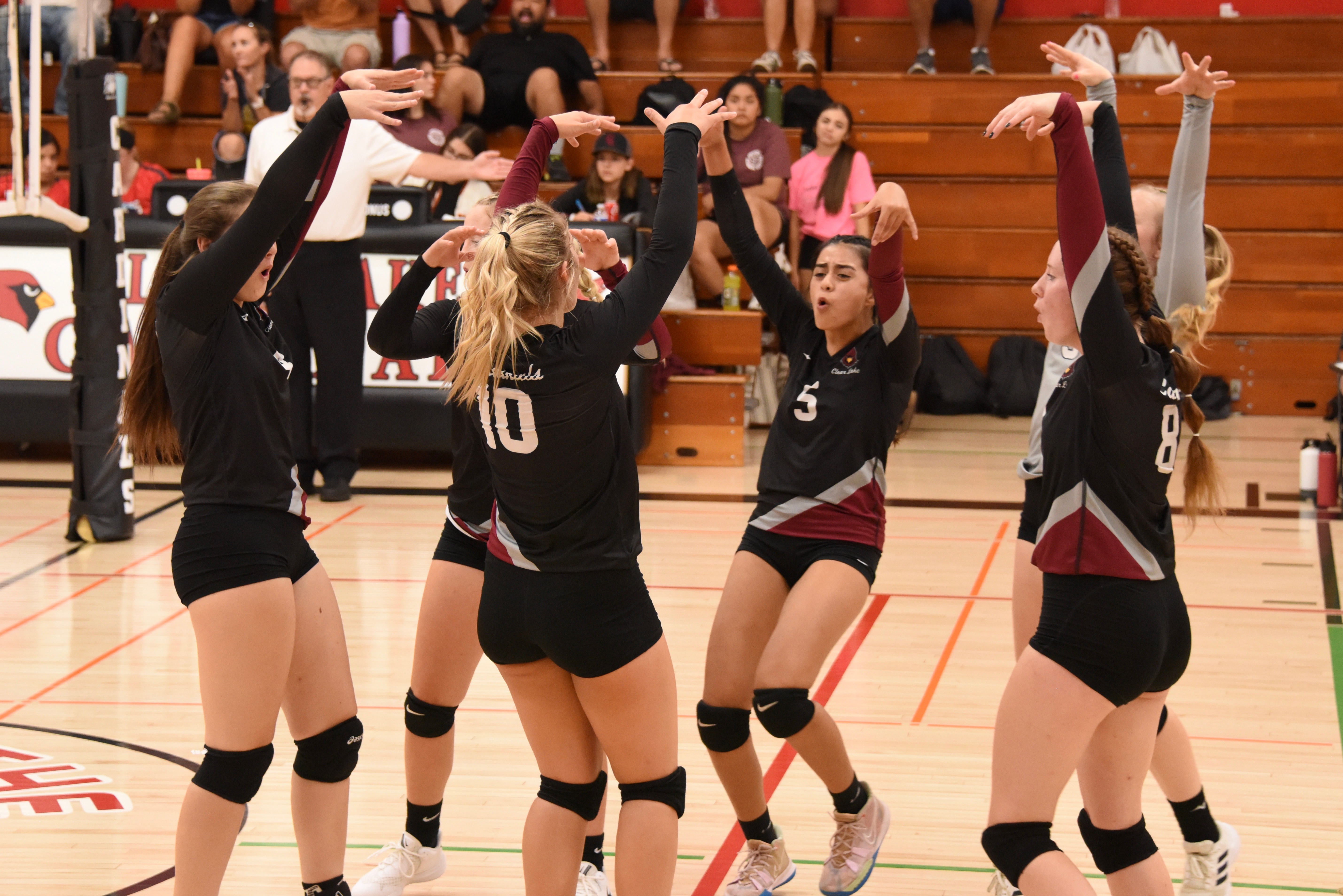 From left, Montana Wells, Sierra Bruch, Quincy Paarsch, Rubi Ford, Amber Smart and Stella Hill do that voodoo they do after winning a point against St. Helena. (Photos courtesy of Trett Bishop)