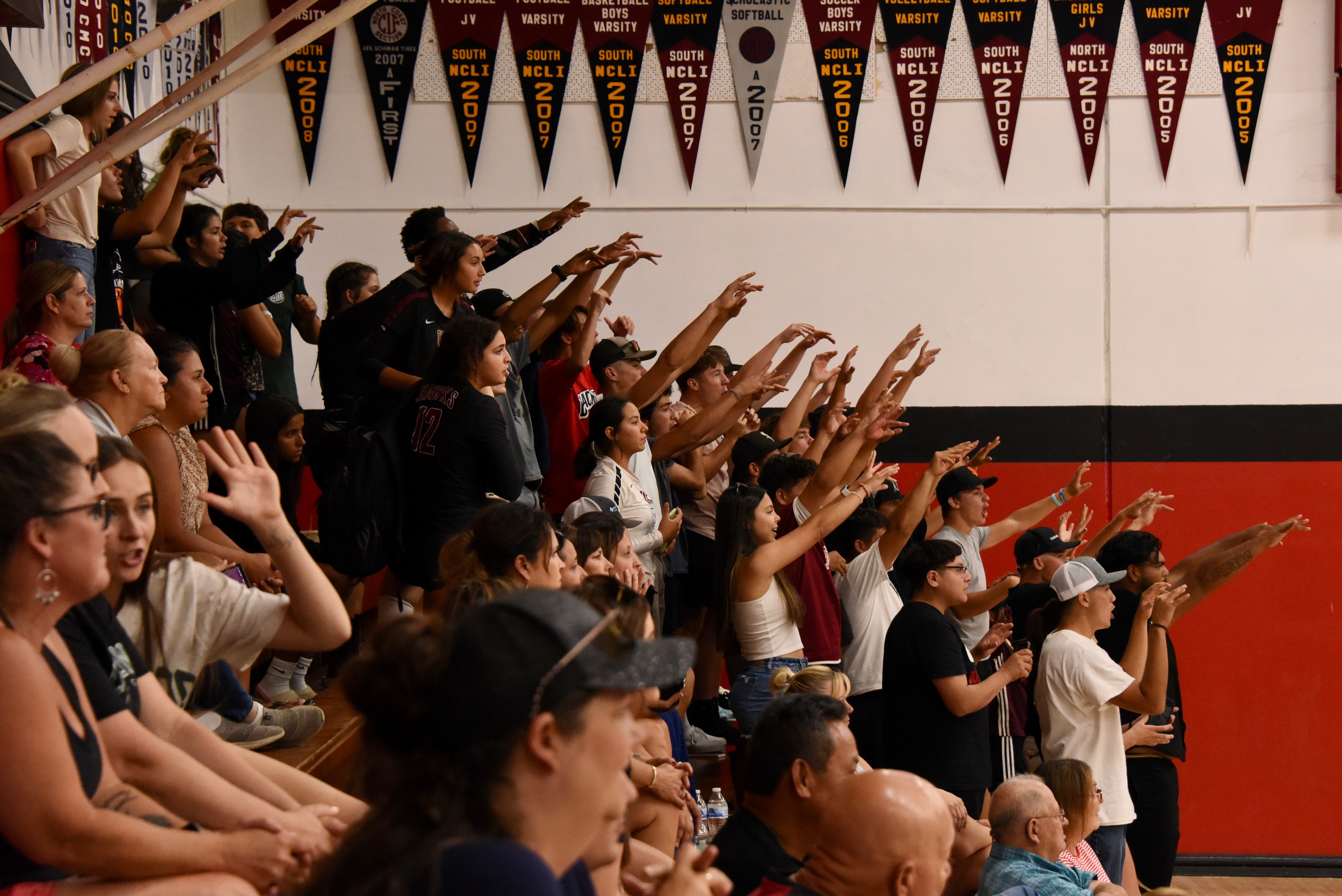 Clear Lake fans cheer on the Cardinals Tuesday night against Colusa in the season opener for both of these varsity volleyball teams at Lakeport. (Photo courtesy of Trett Bishop)