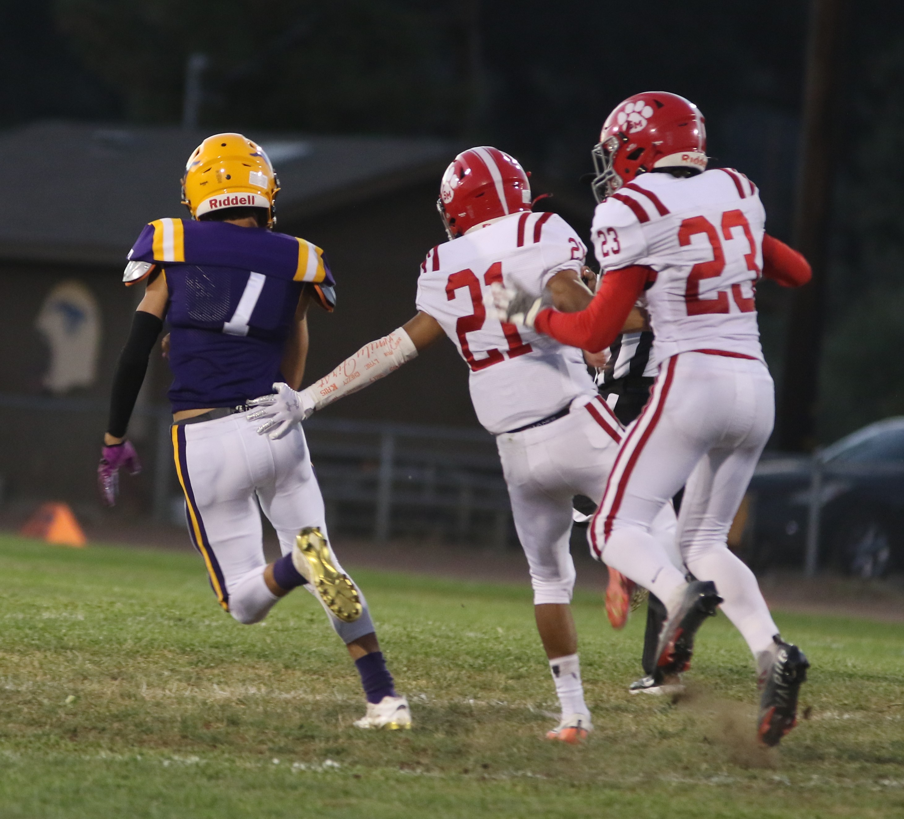 Middletown wide receiver Troy Taber breaks loose on a 28-yard gain to the St. Mary's 37-yard line in the third quarter as St. Mary's defenders William Hudacko (22) and Marley Filson (23) chase him down. (Photos by Minenna Photography)