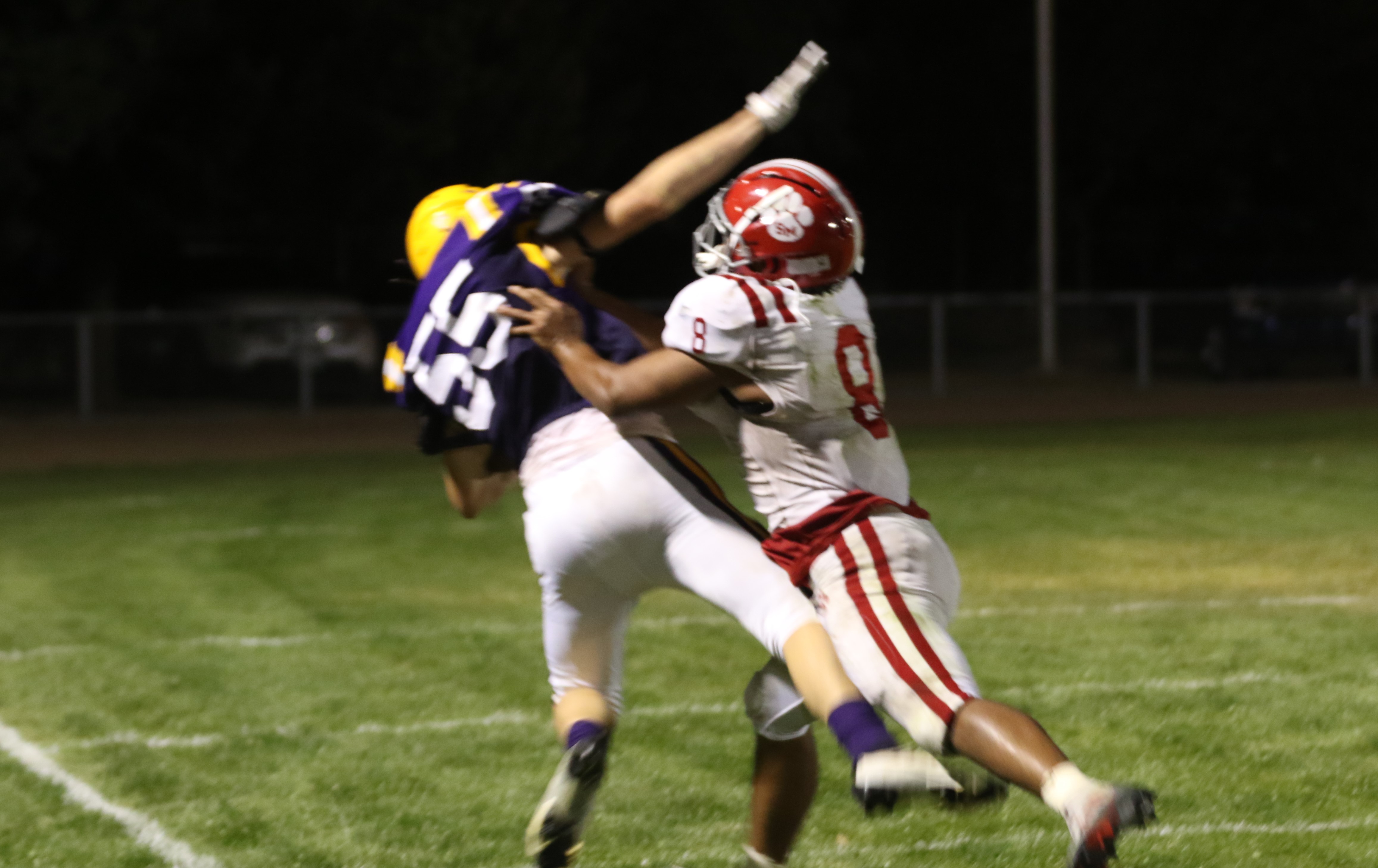 Middletown's Jacob Pullman (55) nearly came up with the play of the game late in the fourth quarter, returning a punt to the St. Mary's 10-yard line before being knocked out of bounds by Kyle Goree. The Mustangs were trailing 7-0 but couldn't get the ball into the end zone. (Photos by Minenna Photography)