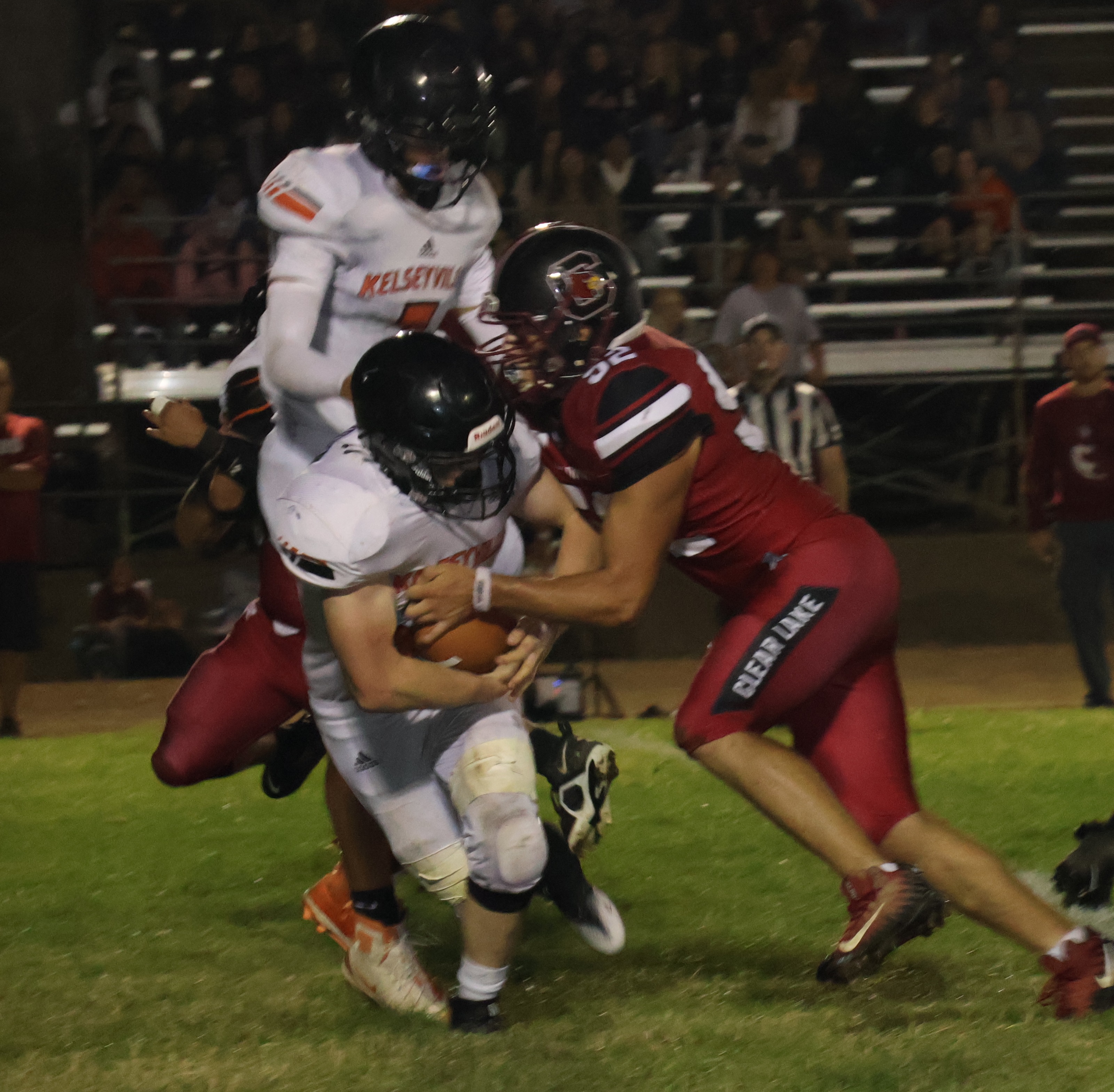 Clear Lake's Tony Gersalia drops a Kelseyville running back for a loss. (Photos by Brian Sumpter)