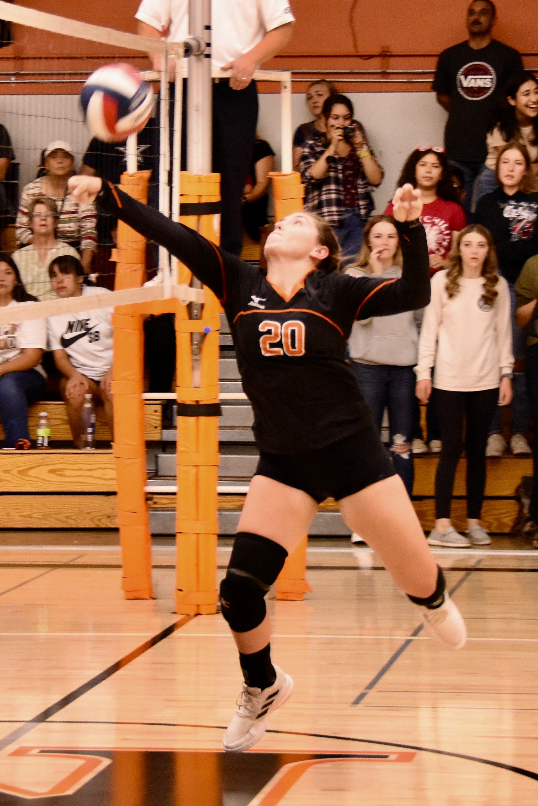 Kelseyville High School setter Jayden Paulich saves a ball from going into the net during Tuesday's action against Clear Lake. The junior registered 24 assists and five aces in the Knights' three-set loss. (Photos courtesy of Trett Bishop)