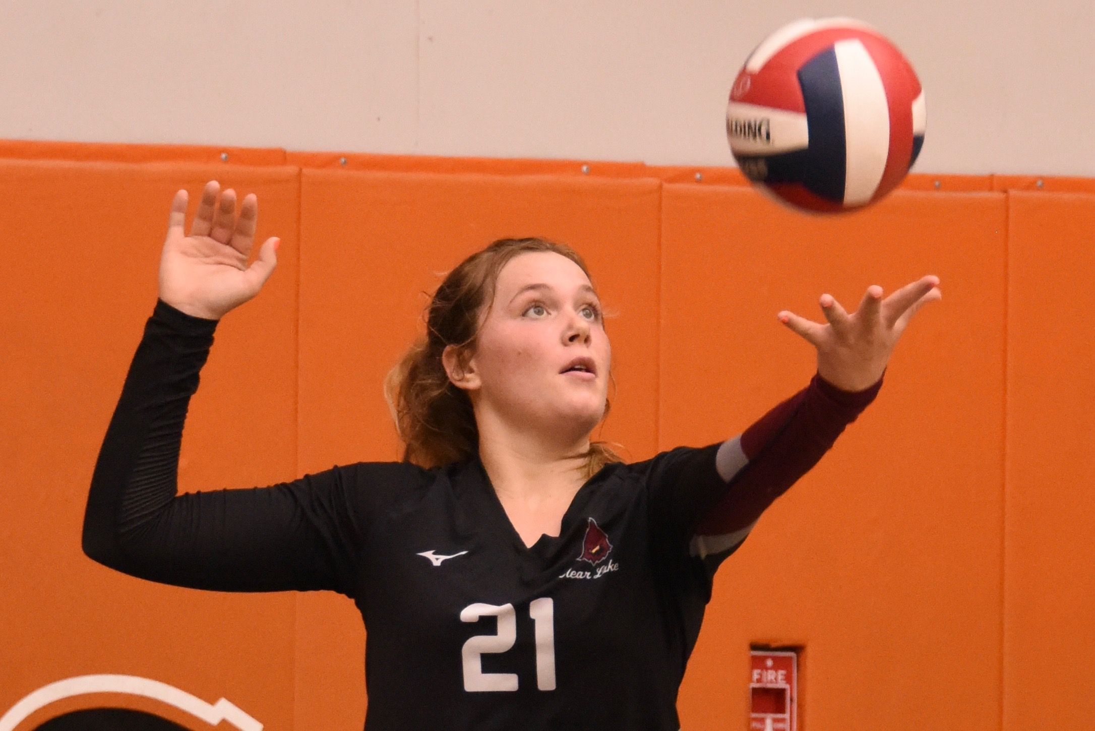 Clear Lake High School's Abby Mertle lines up a serve against Kelseyville. The senior had a big night from the service line in the Cardinals' three-set victory. (Photos courtesy of Trett Bishop)