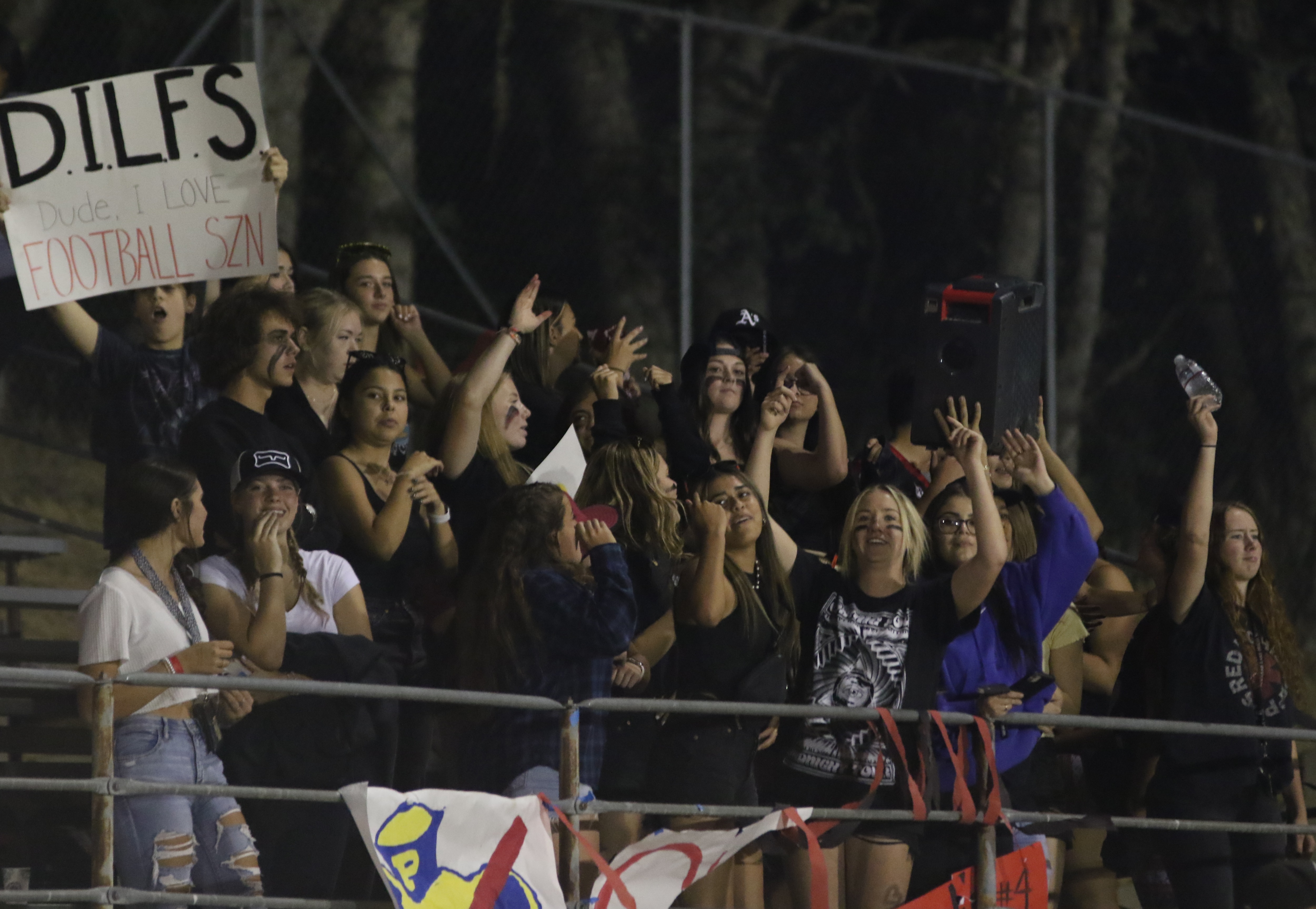 Not everyone was at the nearby Lake County Fair on Friday night. These Clear Lake fans showed up in force to root on the Cardinals in their season opener. (Photos by Minenna Photography)