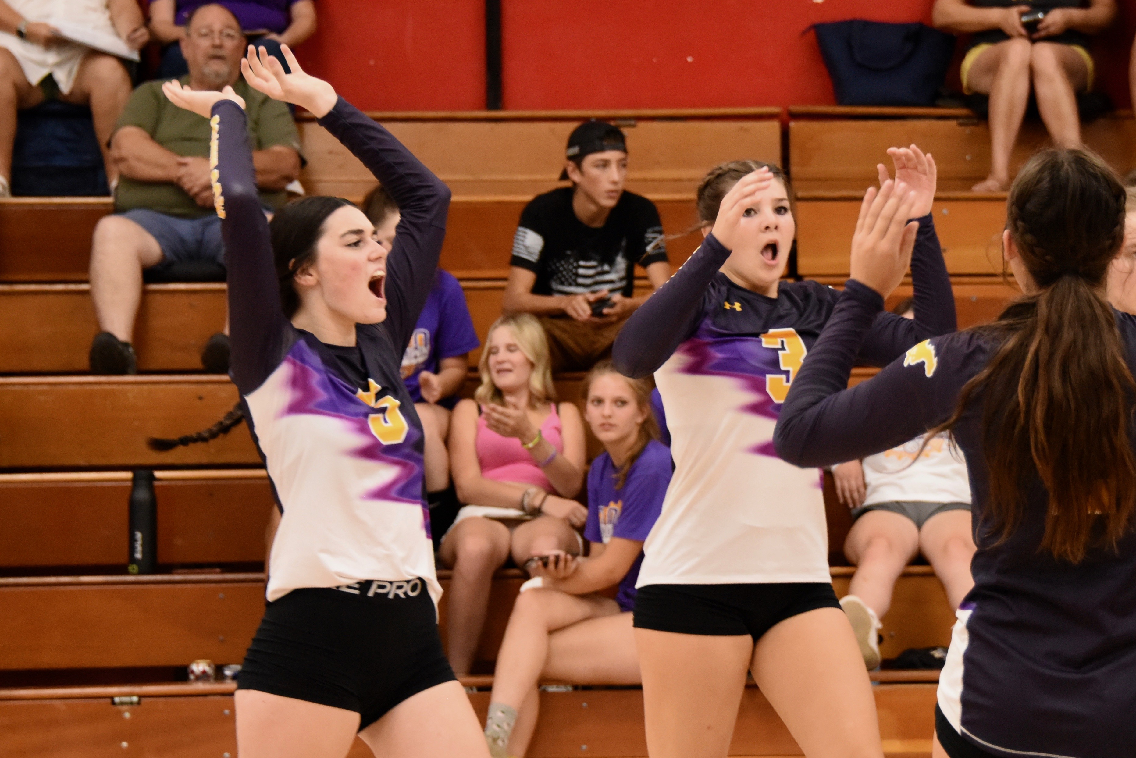 Ring up a point for Middletown as (from left) Kamryn Atkins, Mia Hoogendoorn and Skylar Williams celebrate. (Photos courtesy of Trett Bishop)