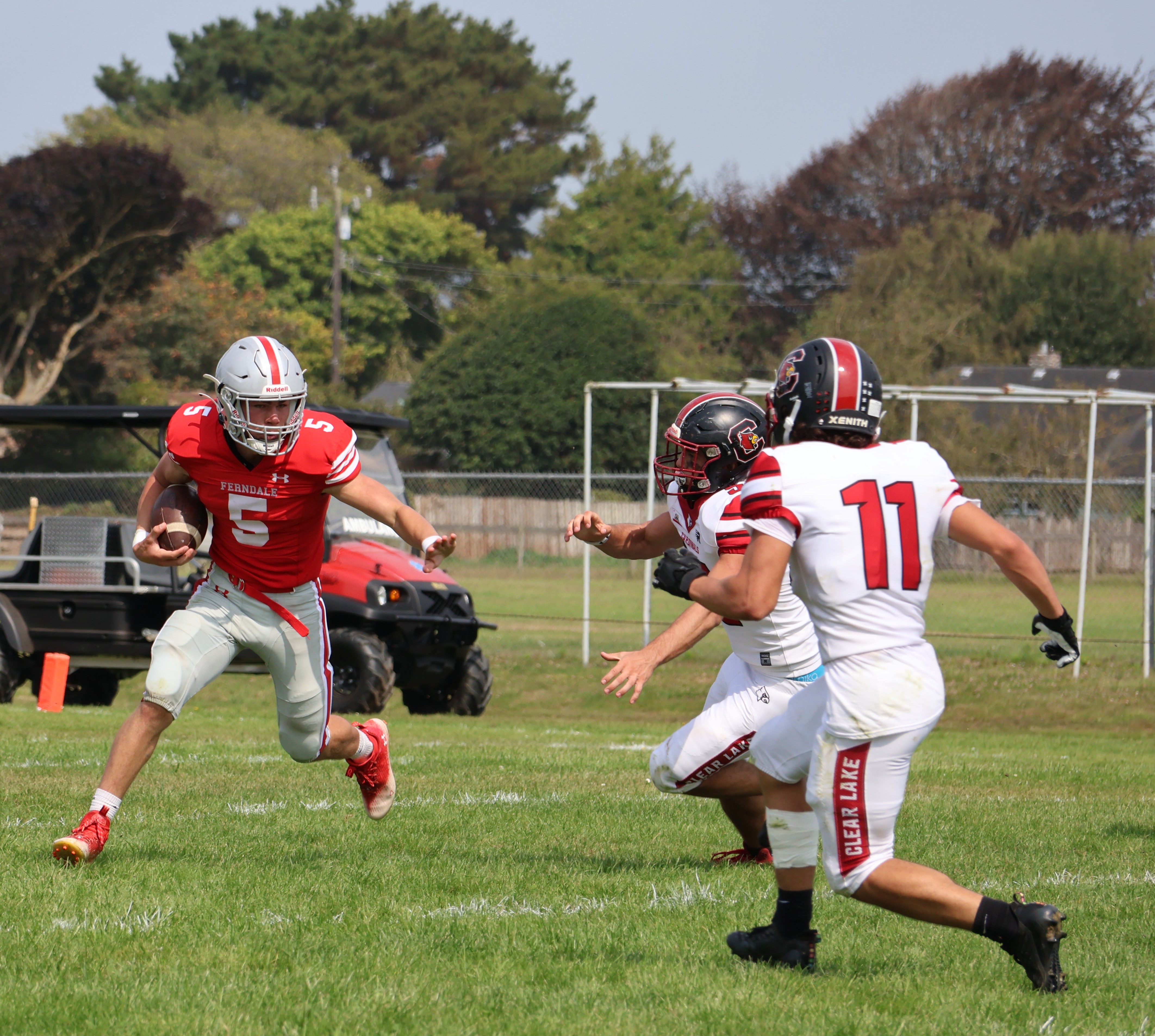 Clear Lake's Saul Reyes (11) and Hank Ollenberger close on Ferndale's Jack Westfall. (Photos by Brian Sumpter)