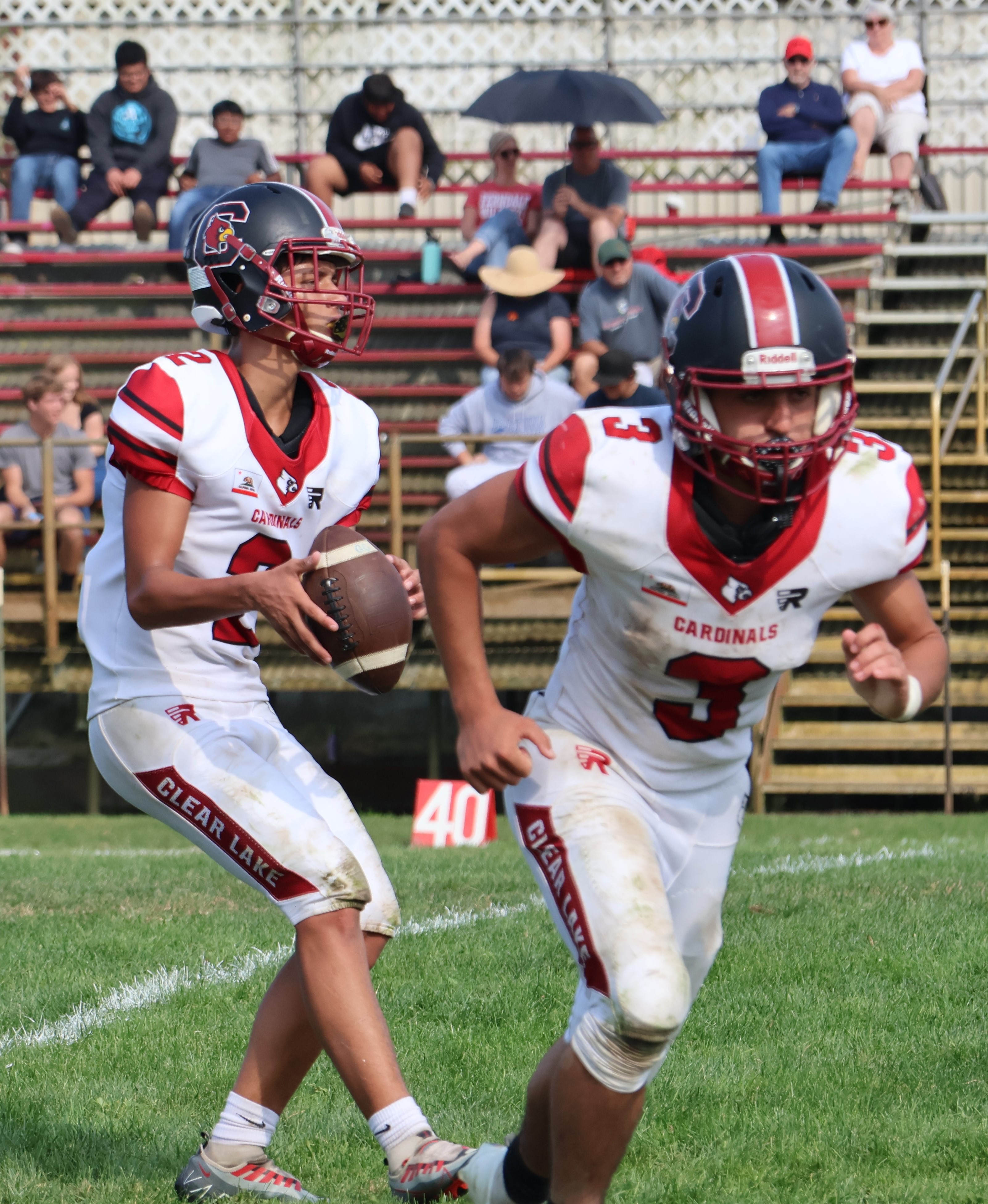 Clear Lake quarterback Graden Greer drops back to pass as running back Hank Ollenberger releases from the backfield. (Photos by Brian Sumpter)