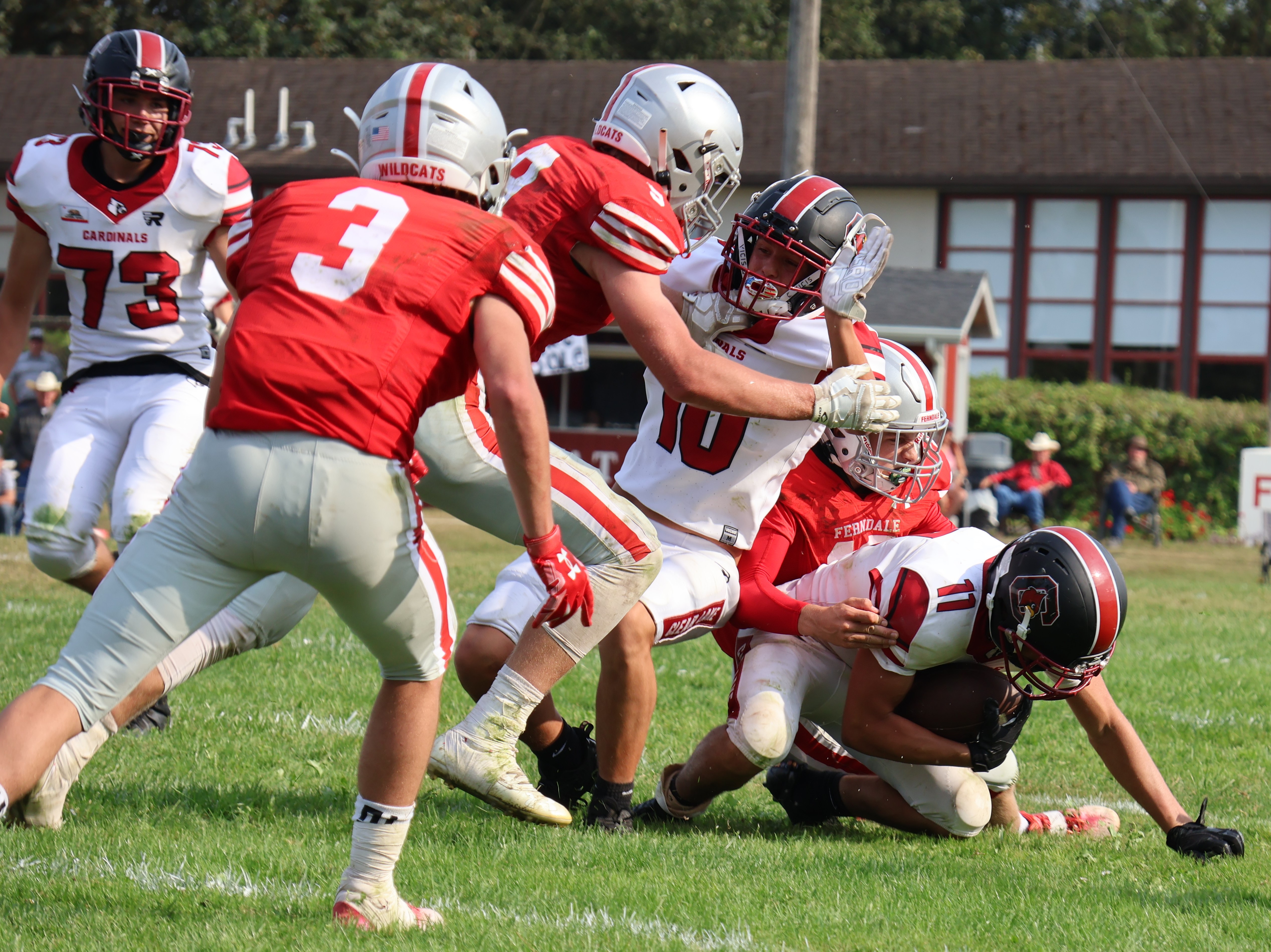 Clear Lake's Saul Reyes recovers an onside kick in the fourth quarter. (Photos by Brian Sumpter)