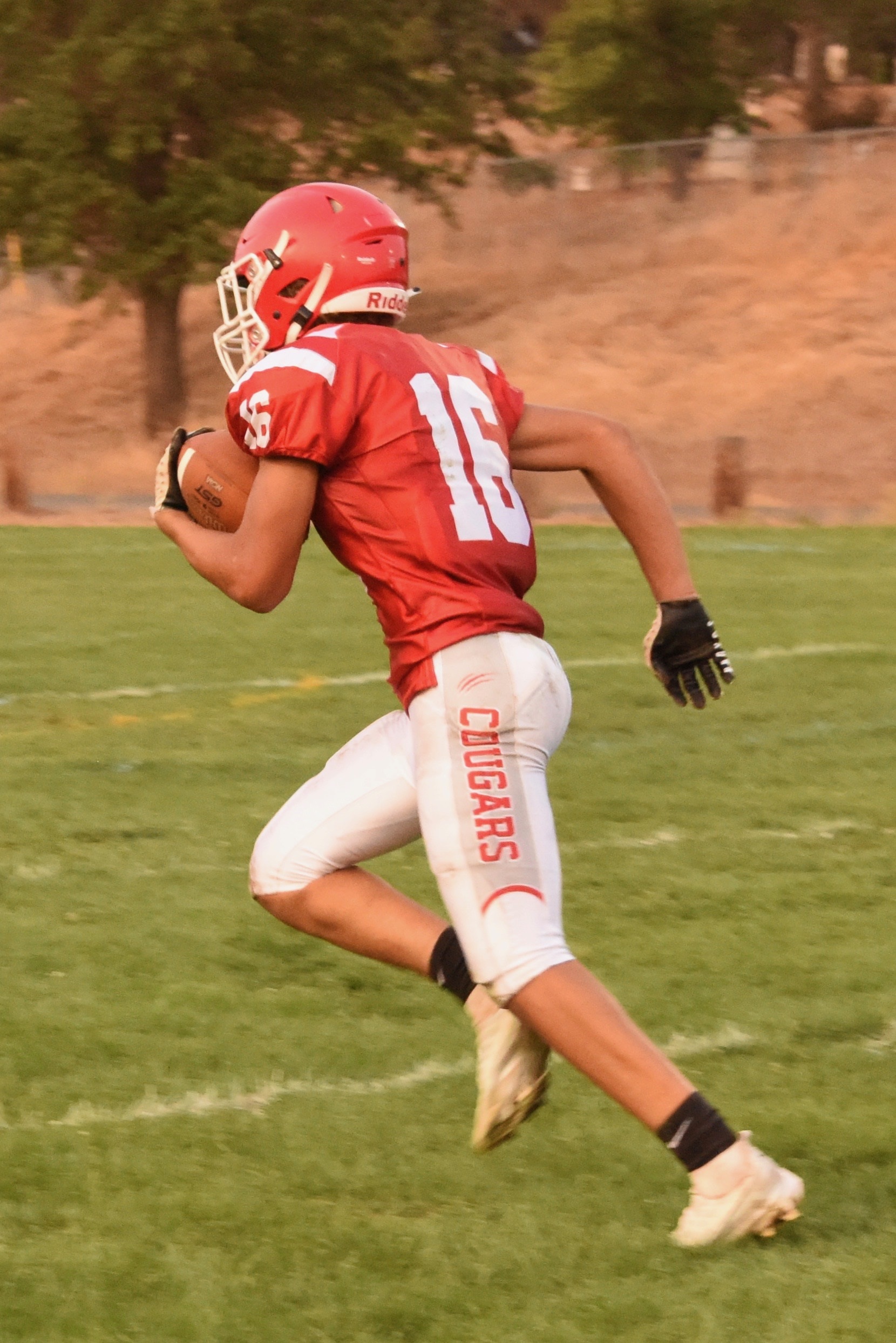 Upper Lake's Delaney Allison breaks into the clear on a 46-yard punt return for a touchdown in the first quarter Friday against Roseland University Prep. (Photos courtesy of Trett Bishop)