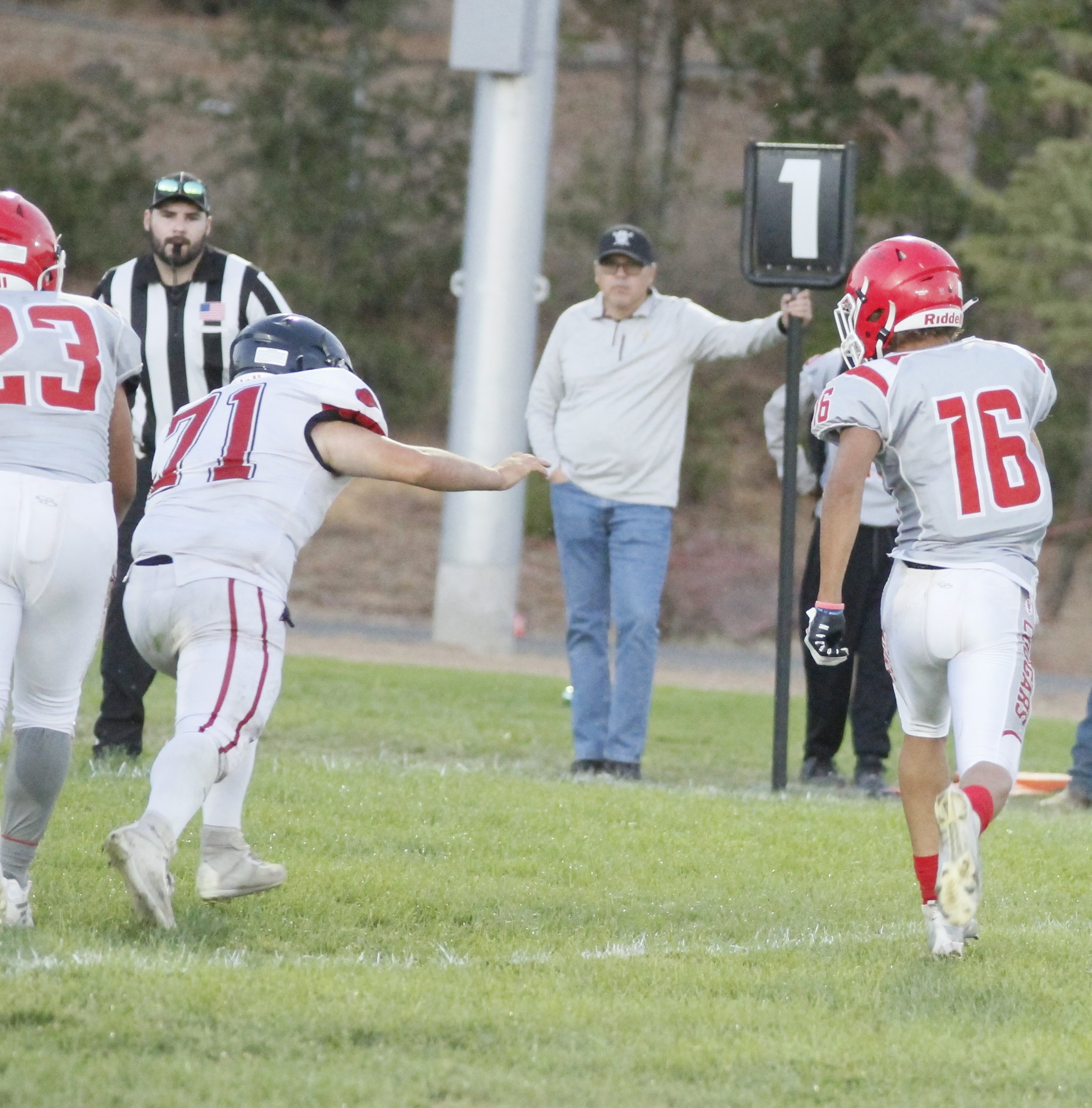 Upper Lake's Delaney Allison breaks into the clear near the Upper Lake sideline. (Photos by Minenna Photography)