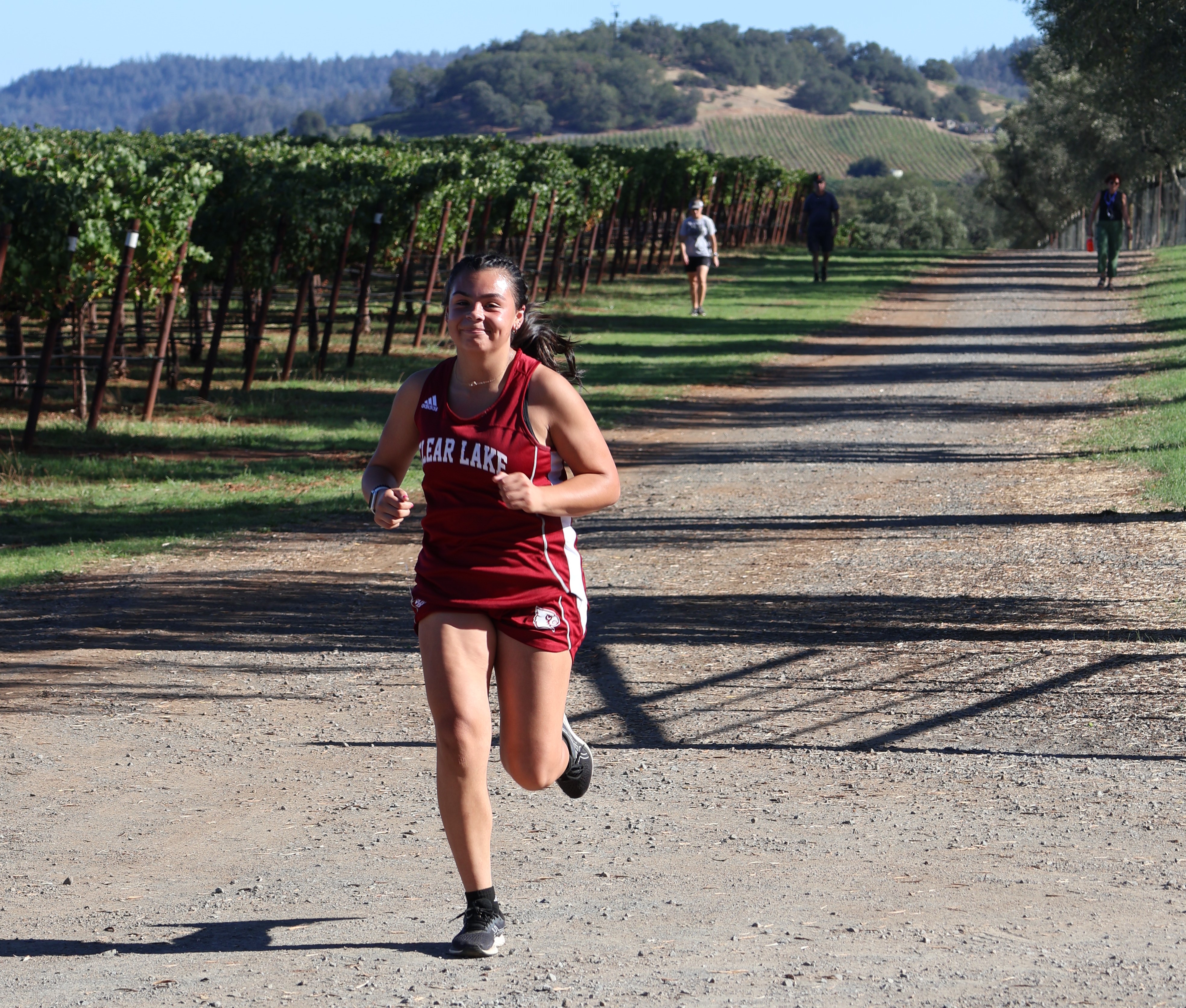 Clear Lake's Lilianna Cruz approaches the finish line. (Photos by Brian Sumpter)