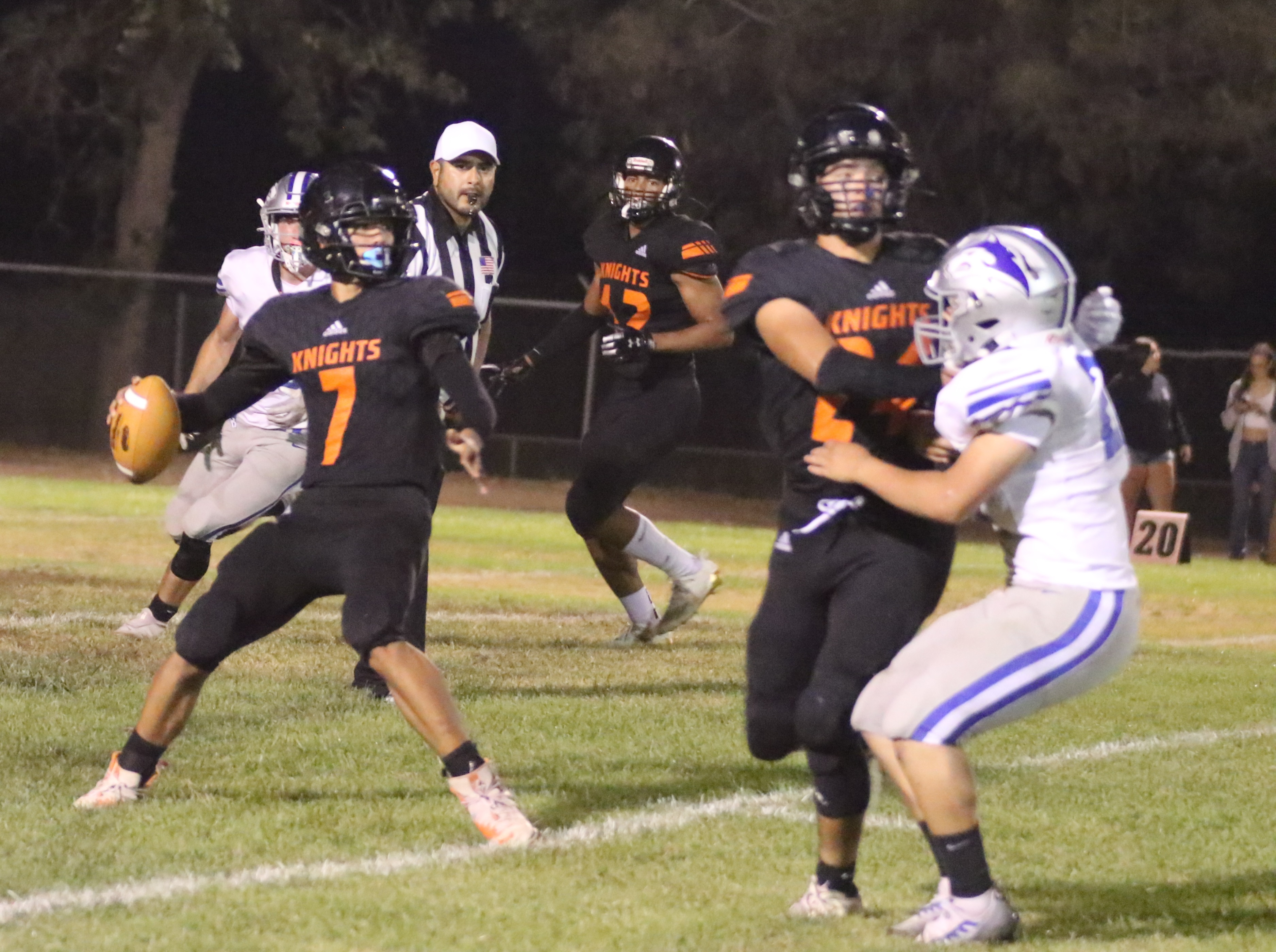 Kelseyville quarterback Luke Watkins readies a throw after spotting an open receiver down the field. (Photos by Minenna Photography)