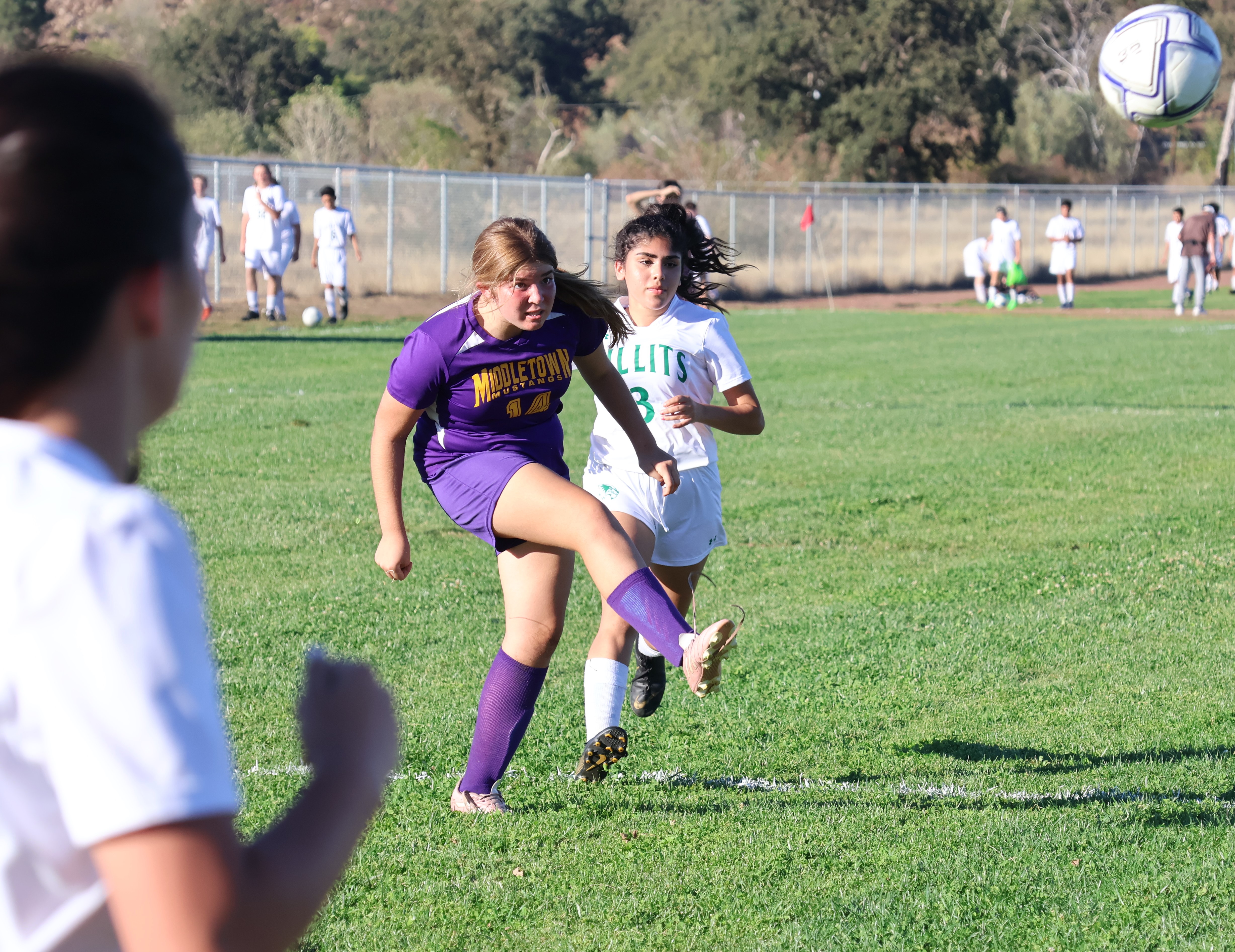 Shay Tufo's second goal of the game, this one in the second half, gave Middletown a 9-6 lead and sealed the victory against the visiting Willits Wolverines. Tufo popped the ball above the Willits keeper's outstretched arms and just below the top frame of the goal. (Photos by Brian Sumpter)