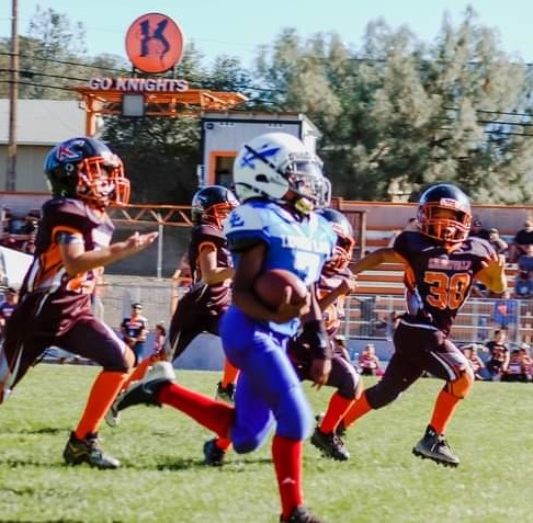 The Lower Lake pee wee youth football team shut out Kelseyville 29-0 for its third straight win on Saturday in Kelseyville. The Trojans are 3-1 on the season. (Photo courtesy of Audreyona Rhiannon Photography)