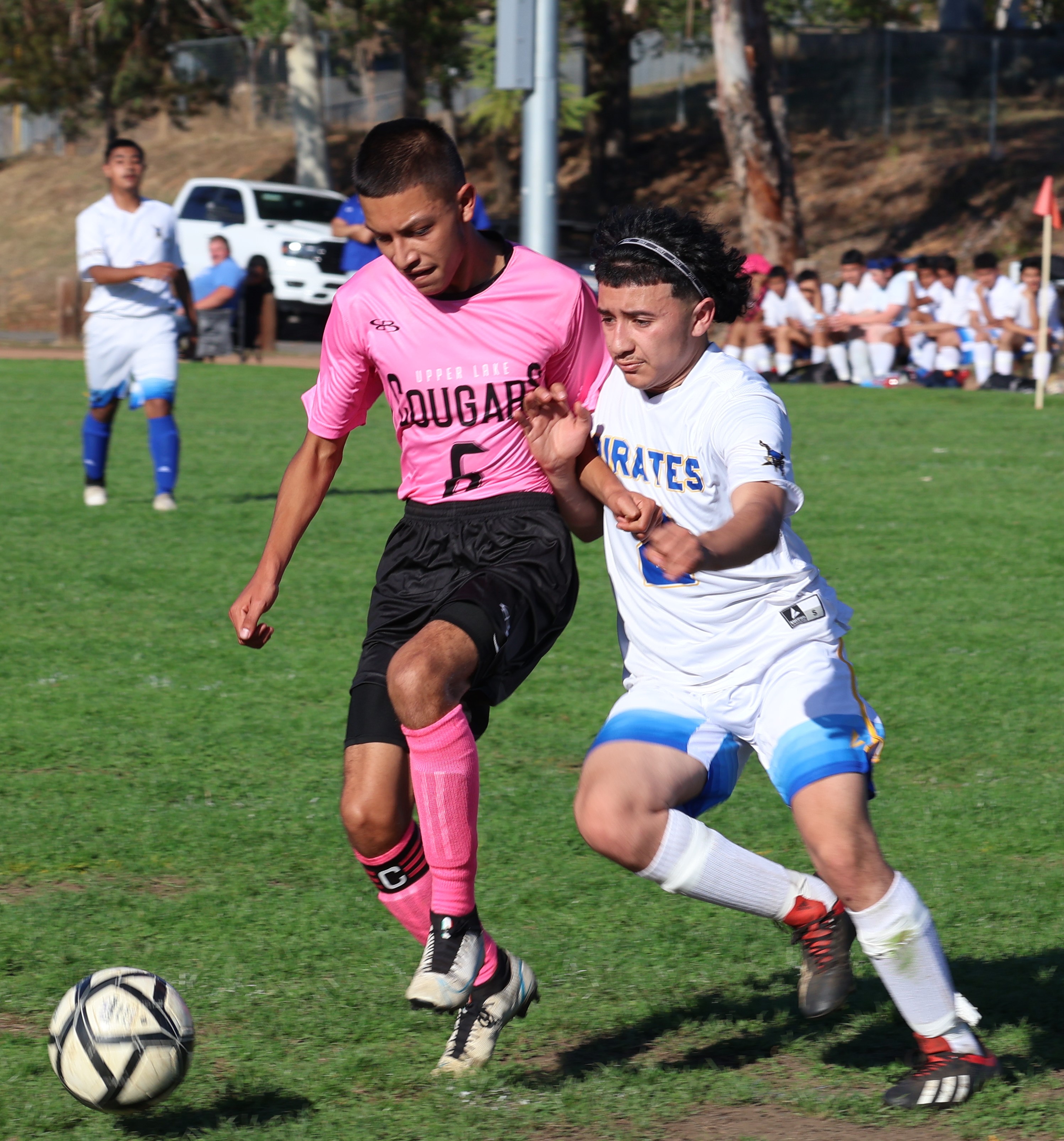 Jonathan Pulido (6), one of Upper Lake's team captains, gets between the ball and a Point Arena player in the first half. (Photos by Brian Sumpter)