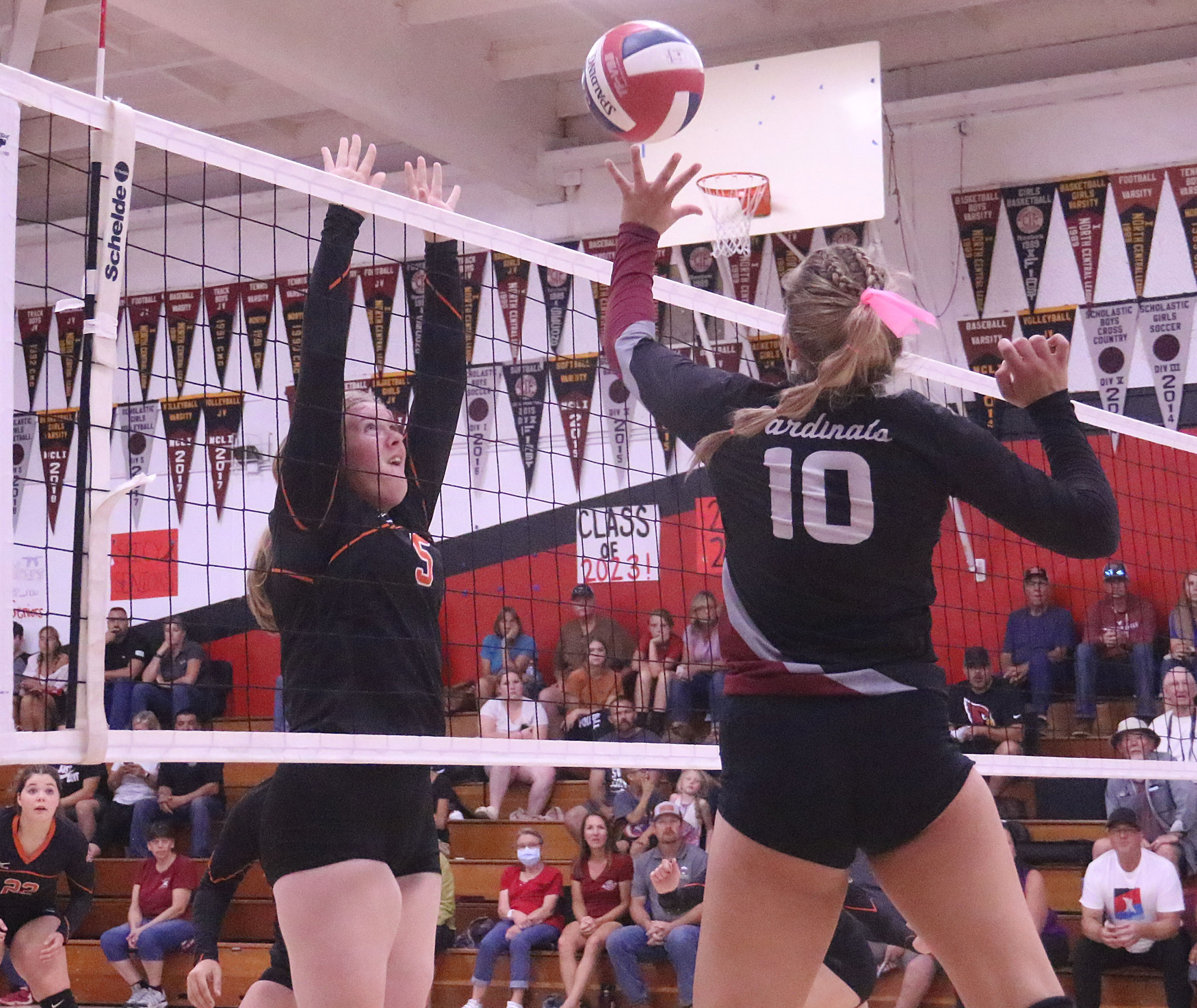 Clear Lake's Quincy Paarsch finished with six kills and 10 digs in a straight-set win over the Kelseyville Knights. Trying for the block at the net is Kelseyville's Faith McIntire. (Photo by Bob Minenna)