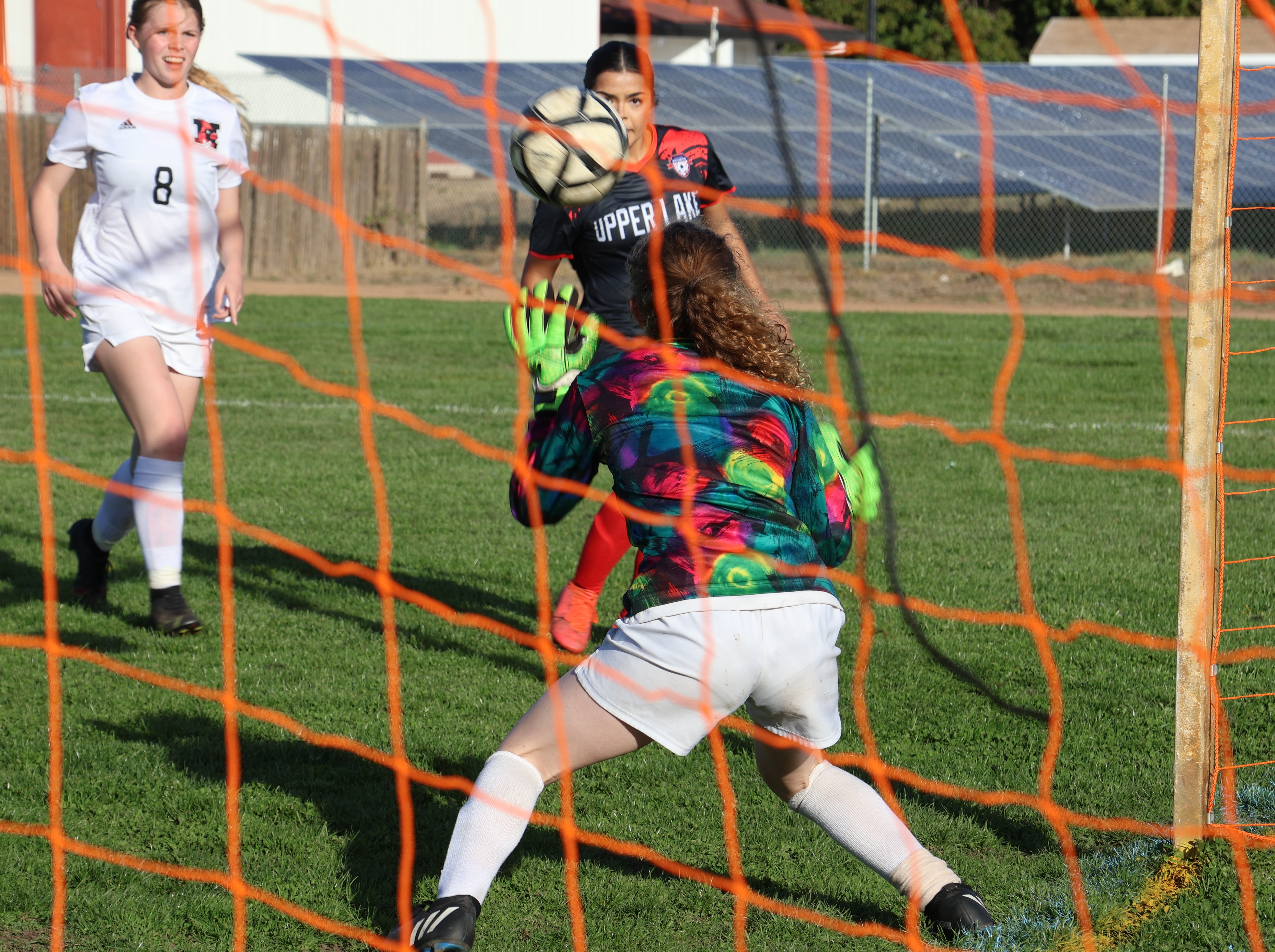 Vanessa Lopez-Becerra follows the trajectory of her shot, which ricocheted off the Mendocino keeper and ended up in the net to give Upper Lake a 2-0 lead. (Photos by Brian Sumpter)