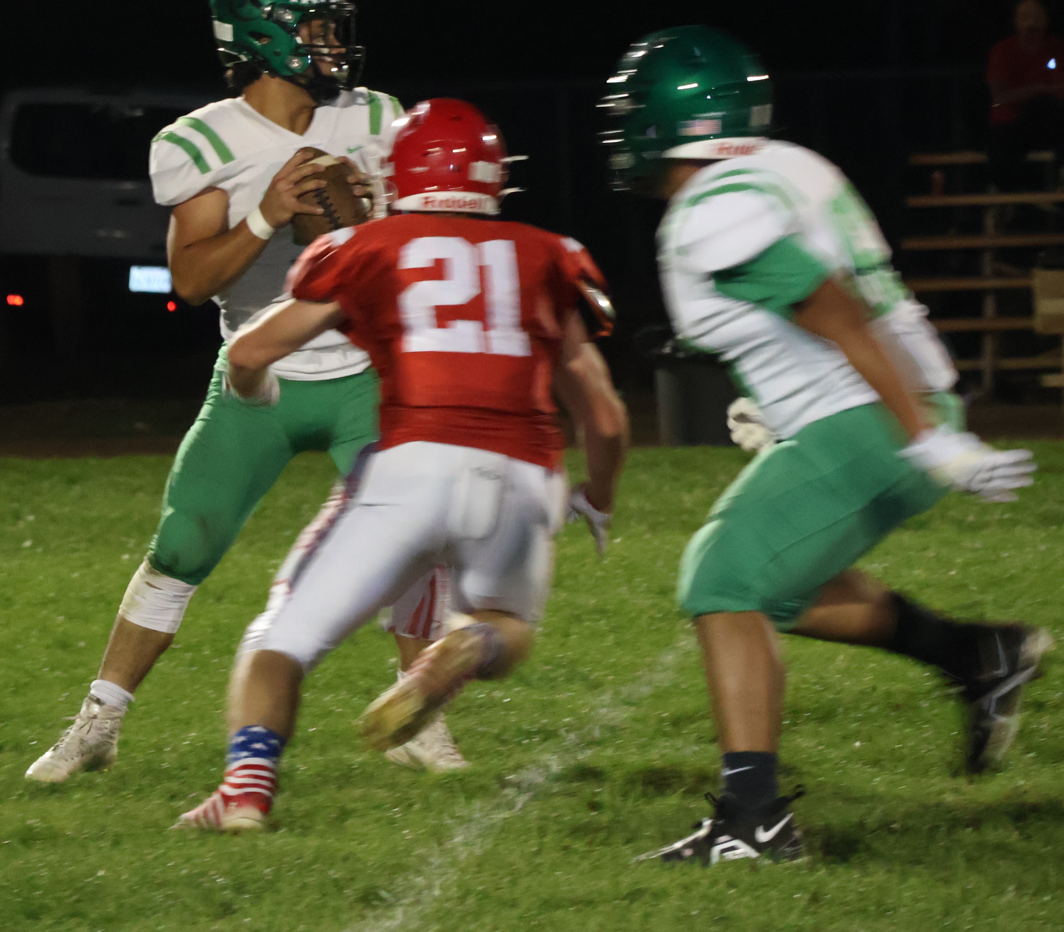 Upper Lake's Will Henry pressures Calistoga quarterback Edgar Caldera. Henry sacked Caldera twice in the Cougars' 38-12 homecoming win. (Photos by Brian Sumpter)