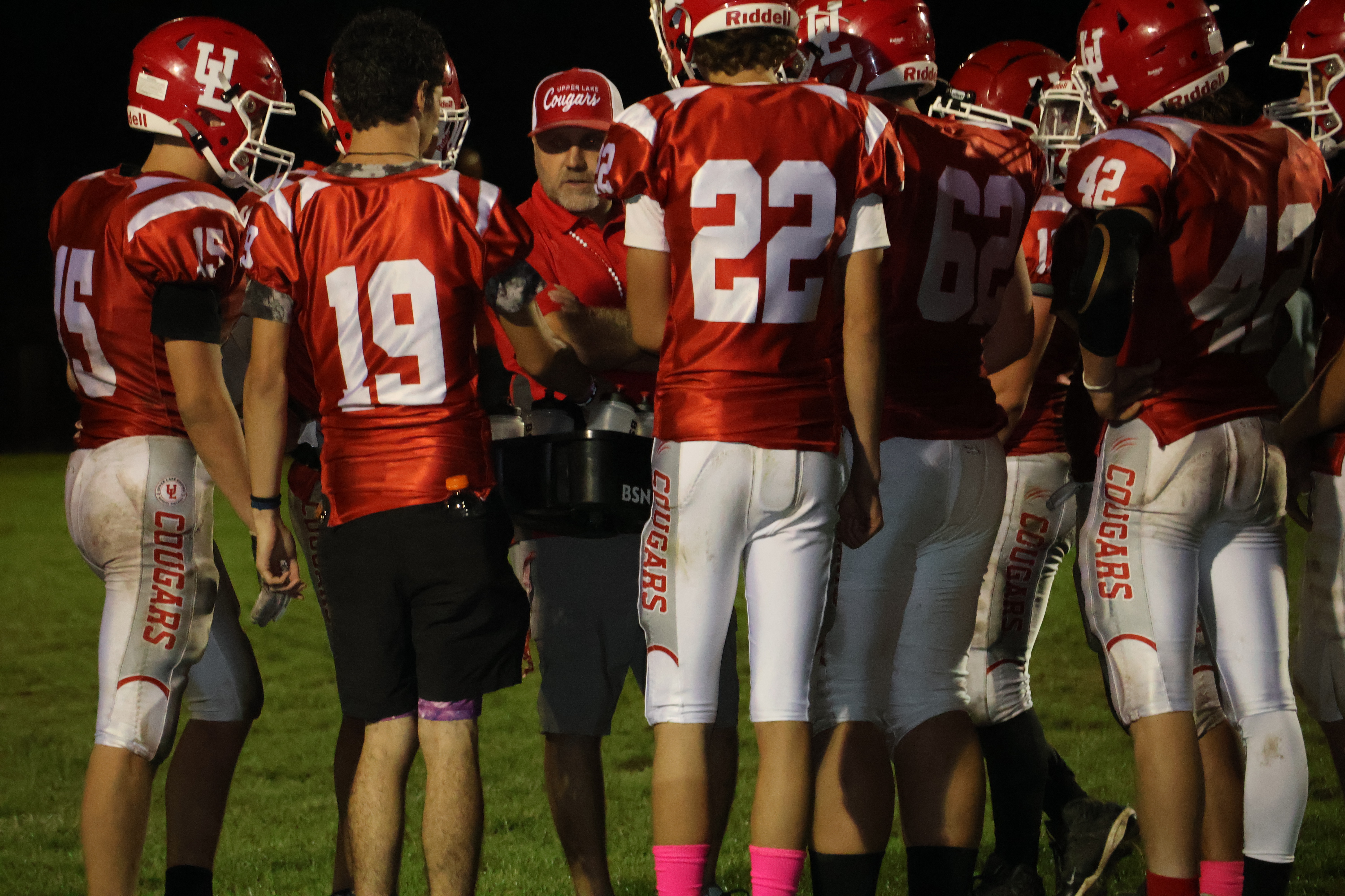Upper Lake head coach Vince Moran huddles with his players during a timeout in the second half. (Photos by Brian Sumpter)