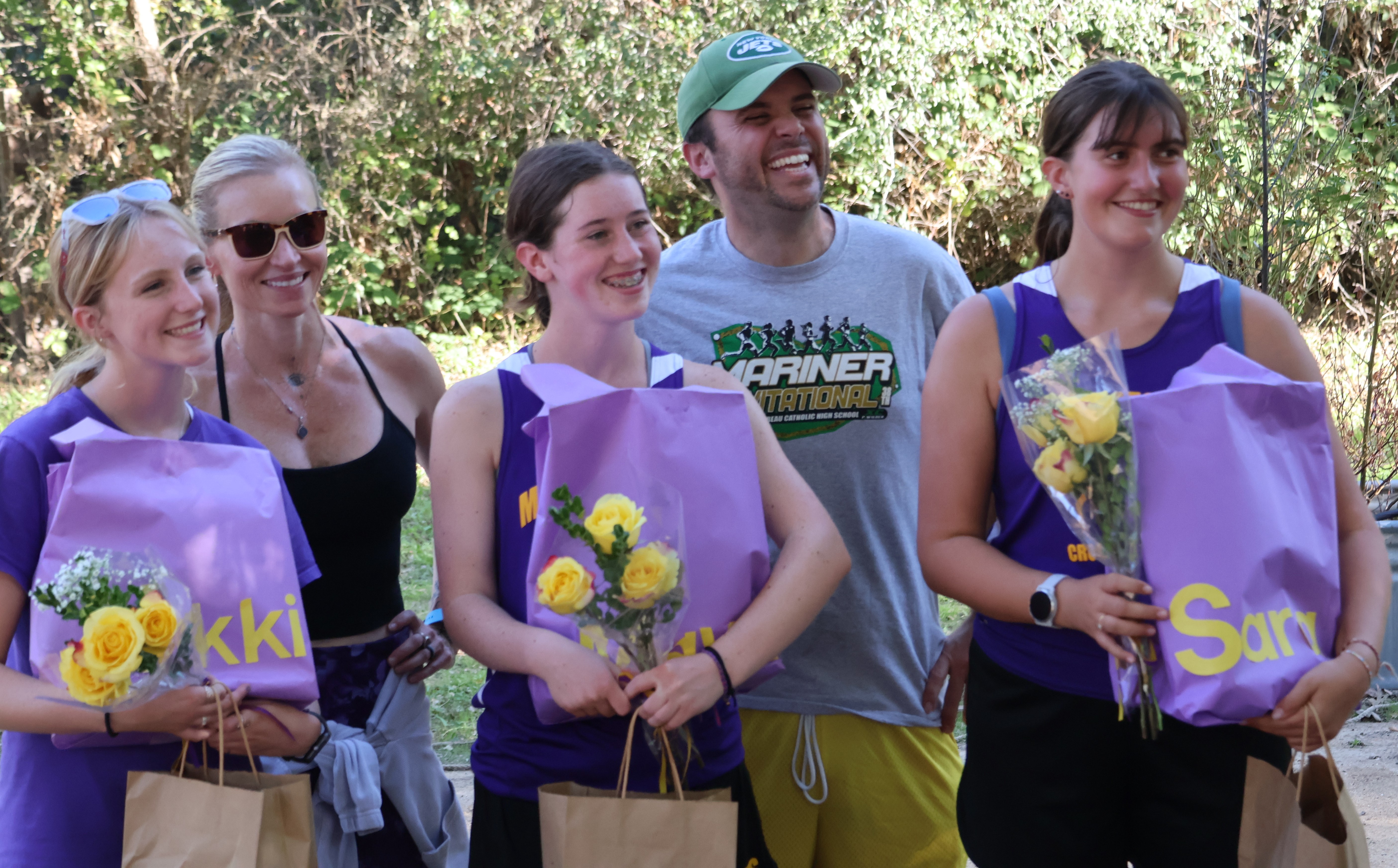 From left to right are Middletown High School senior Nicole Pyzer, assistant coach Anna Schneider, senior Maya Leonard, head coach Taylor Tiraterra and senior Sara Sintubin, a foreign exchange student from Belgium. Pyzer, Leonard and Sintubin were honored during the final home meet of the season. (Photos by Brian Sumpter)