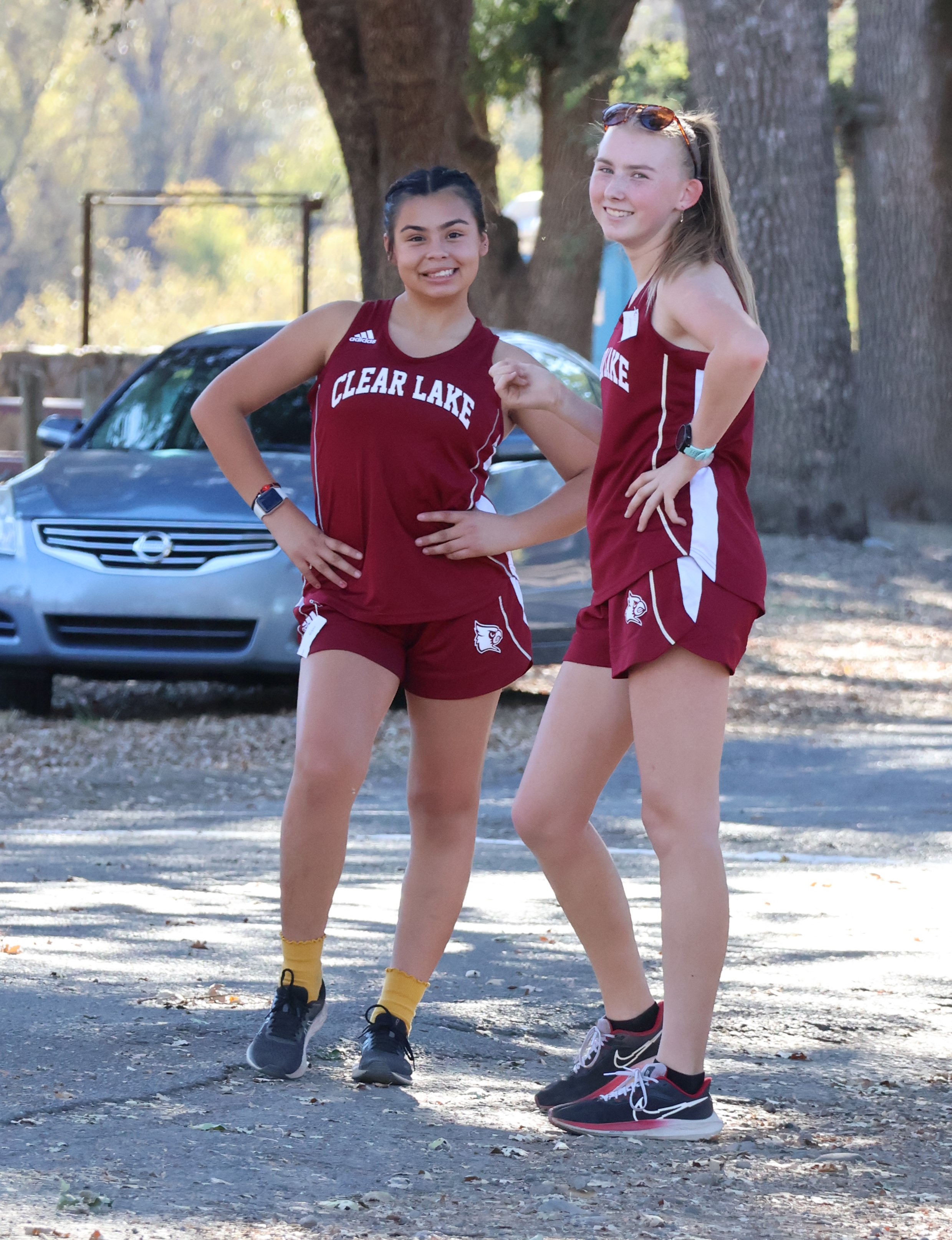 Clear Lake teammates Lilianna Cruz (left) and Hannah Garrity have a bit of fun before making their way to the starting line. (Photos by Brian Sumpter)