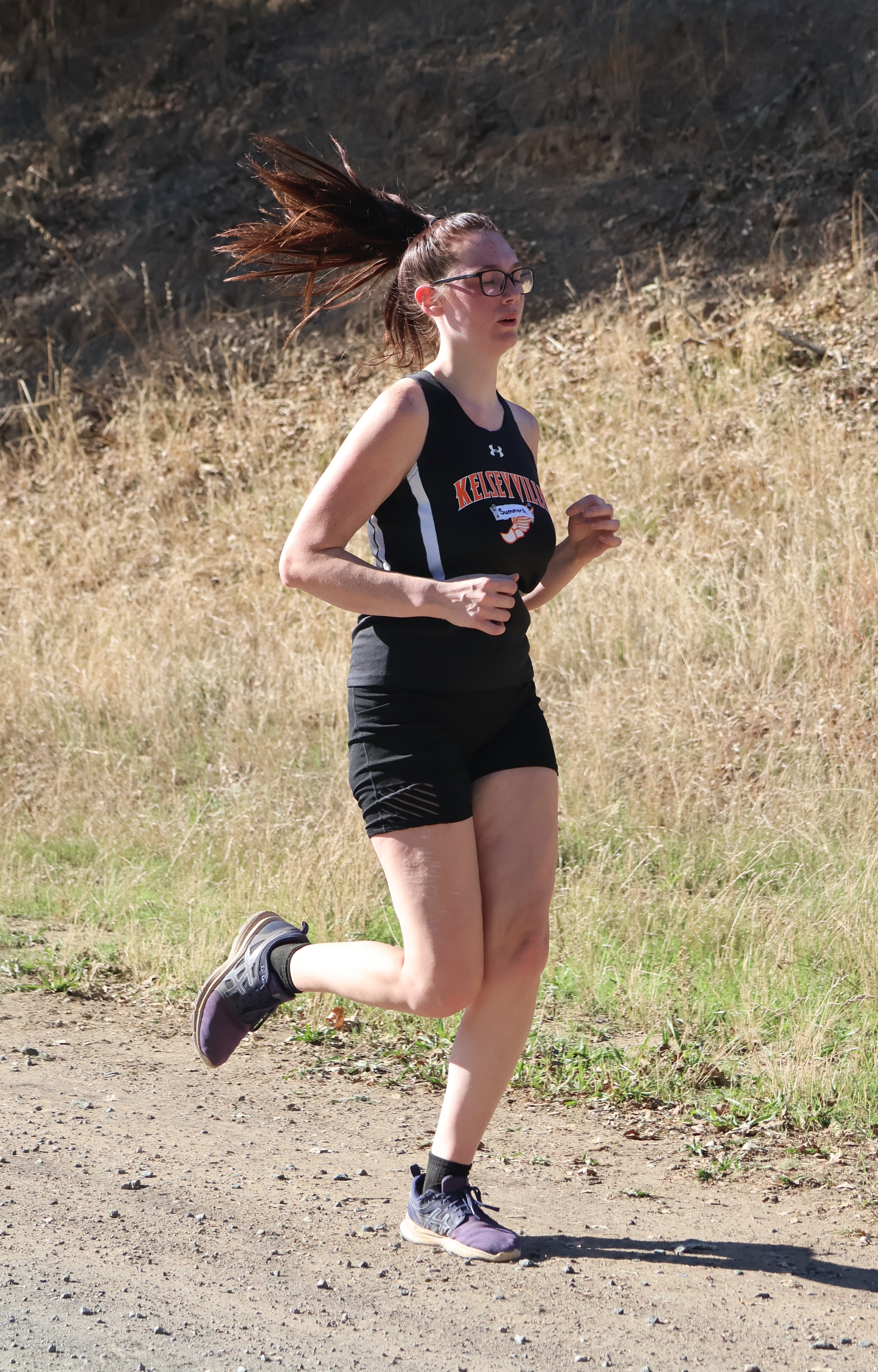 Kelseyville's Summer Anderson nears the finish line in the girls race. She placed ninth overall in a personal-best time of 29 minutes, 3 seconds. (Photos by Brian Sumpter)