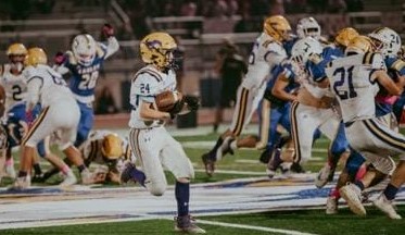 Talk about an impressive varsity debut. Middletown freshman running back Trenton Griffith rushed for 244 yards and three touchdowns Friday night to help lead the Mustangs to a 36-29 victory over Cloverdale, the 300th career win for head coach Bill Foltmer. (Photos courtesy of Geri Costlow)