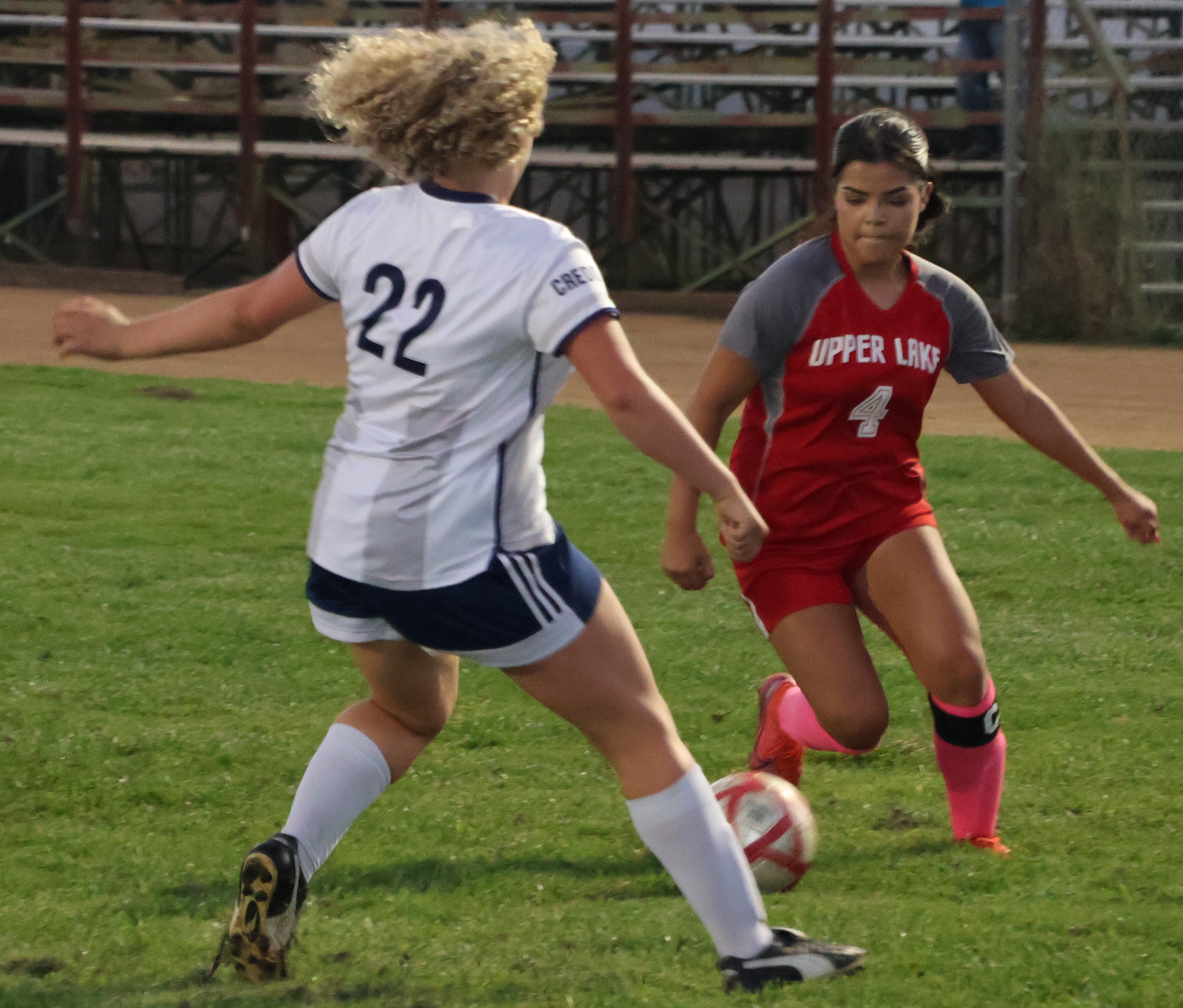 Vanessa Lopez-Becerra looks for an opening to shoot the ball in the second half as Credo's Aidyn Cresalia-Clark defends. (Photos by Brian Sumpter)