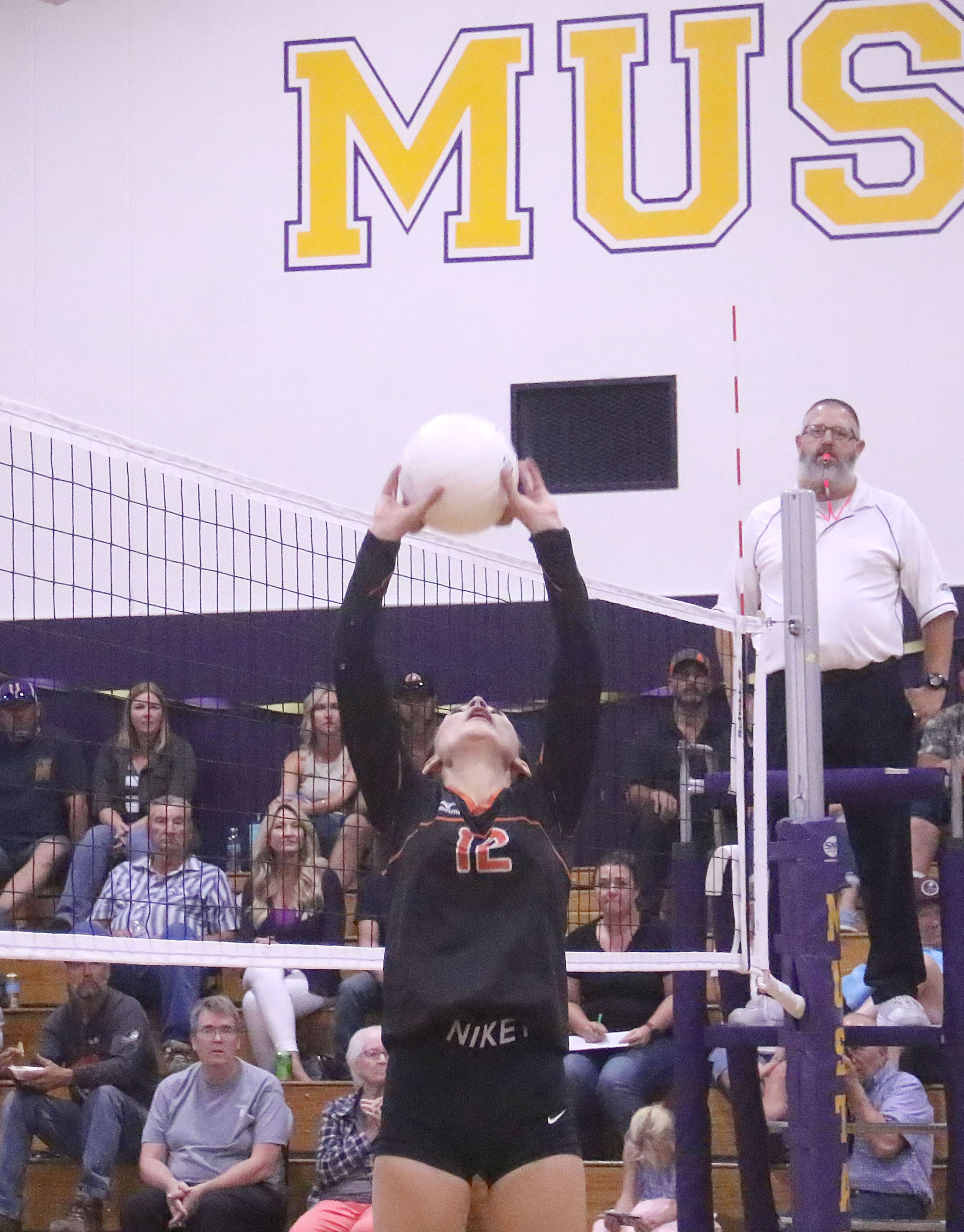 Ashlyn Klein sets the ball for Kelseyville on Tuesday night in Middletown. Klein and Jayden Paulich shared setting duties in the Knights' five-set road victory over the Mustangs. (Photos by Minenna Photography)